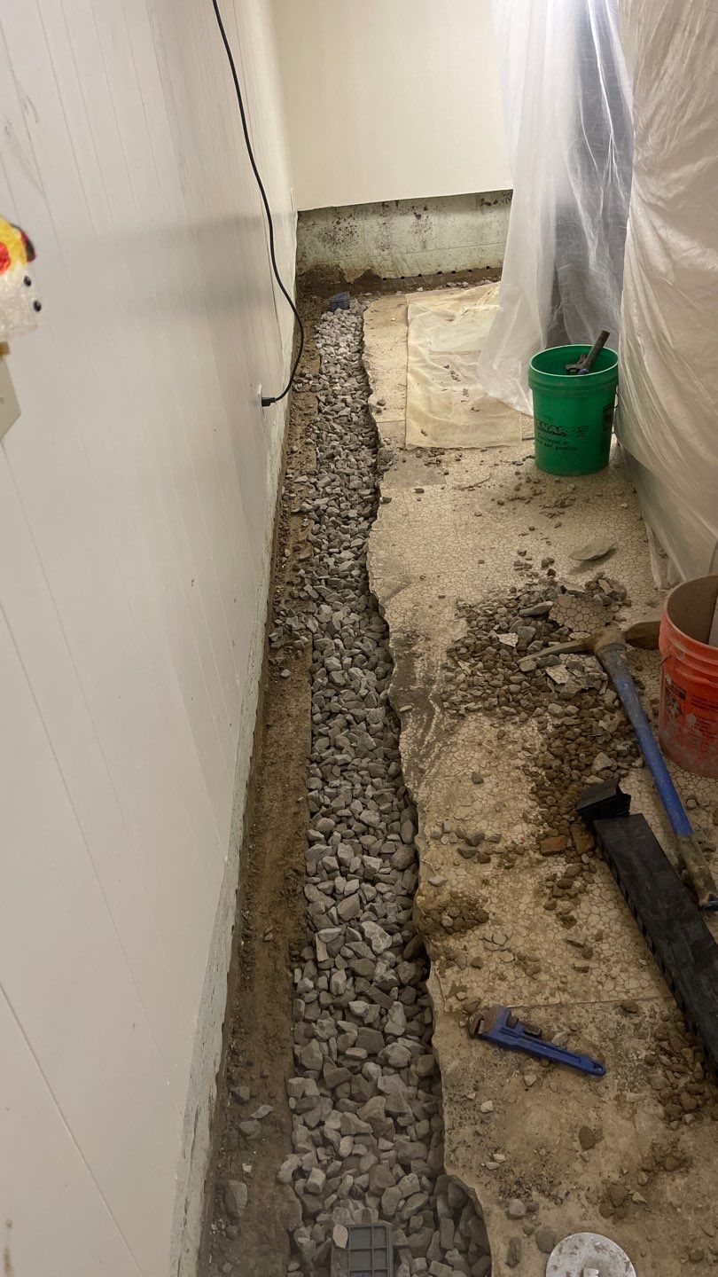 Interior Waterproofing Using GrateDrain™ Products by Toledo Basement Repair 