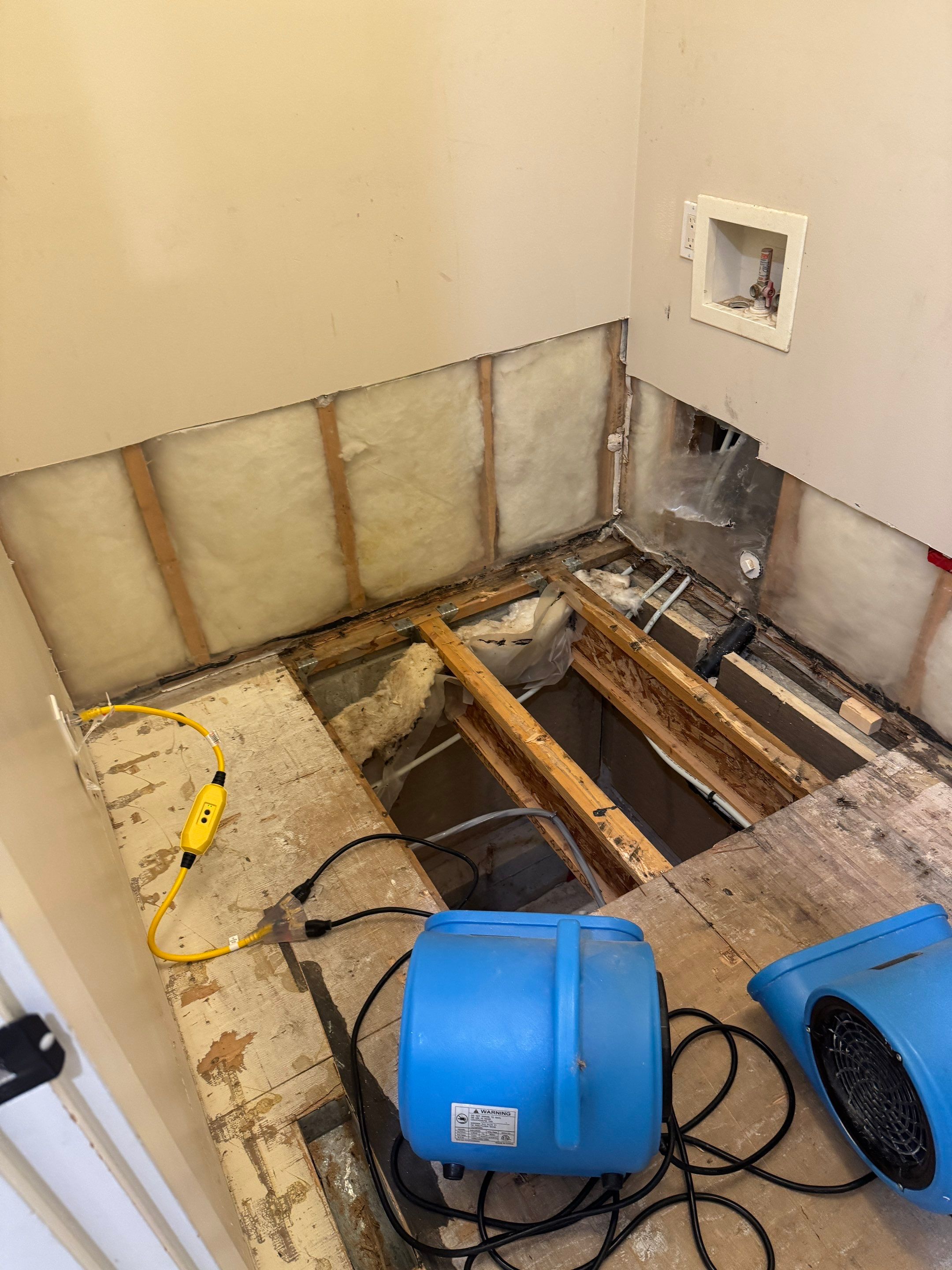 High-End Laundry Room Renovation and Restoration in Vancouver by YVR Construction Group