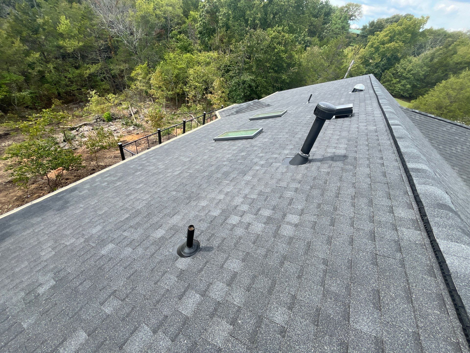 Residential Roofing + Gutters & Downspouts Install  by Titan Commercial & Residential Roofing 