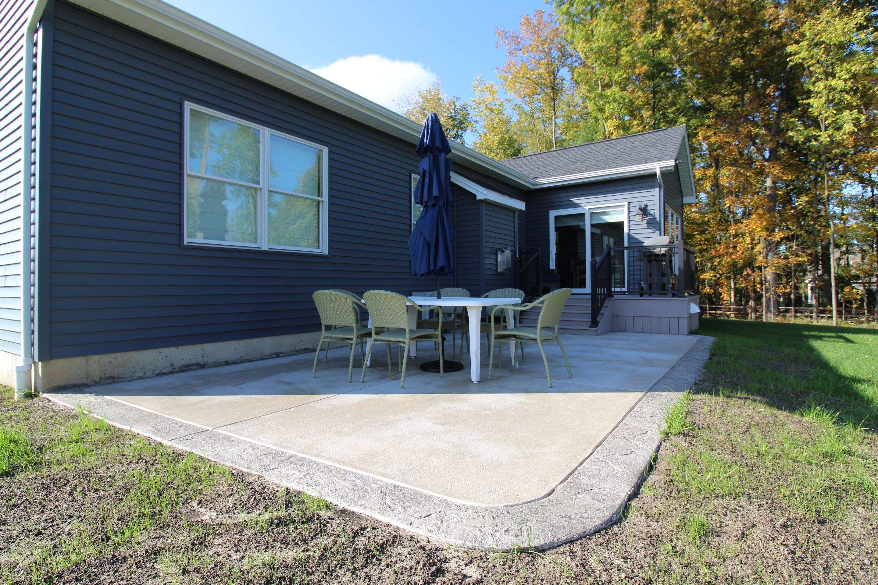 Outdoor Living- Deck and Concrete by Ivy Lea Construction