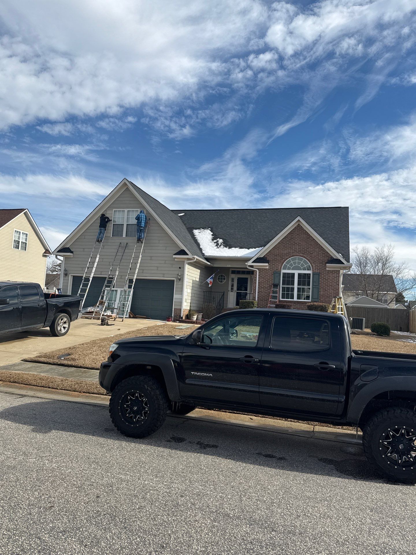 New windows and Exterior Paint by Karcher Roofing & Construction