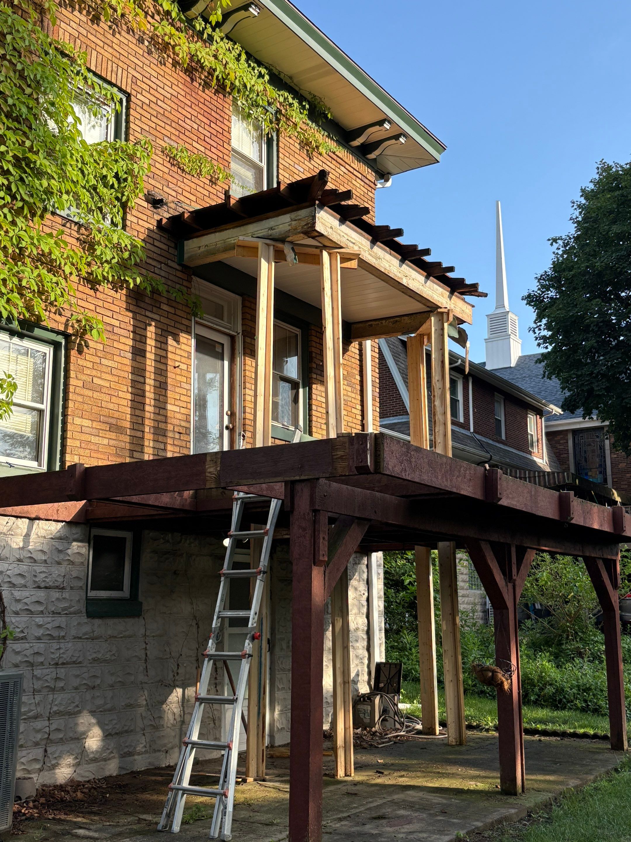 Deck and Roof build  by Cousins Roofing Siding & Decks