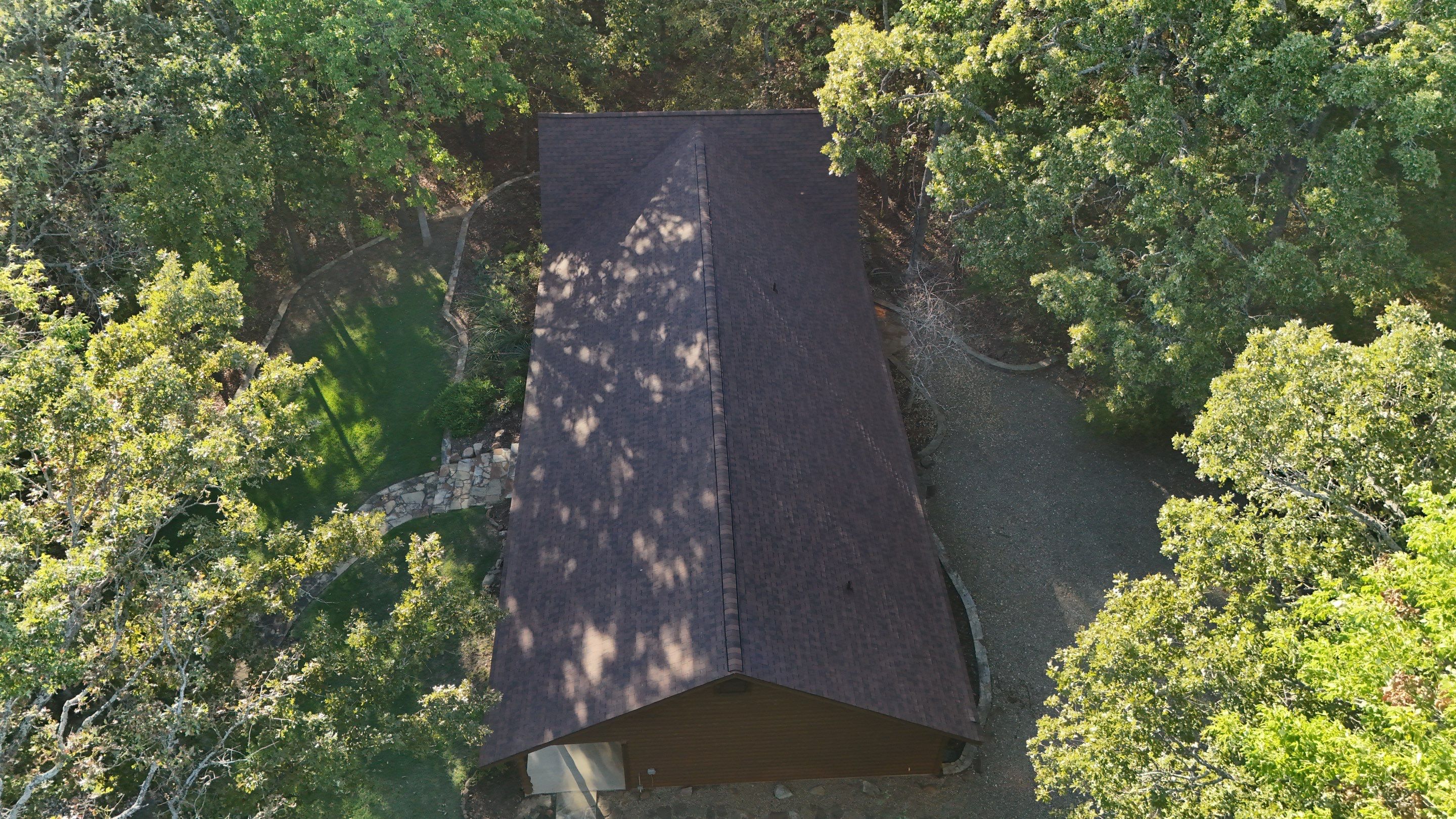 Multi-Building Log Cabin Roof Replacement with Architectural Shingles in Quitman by Armor Roofing | Exteriors
