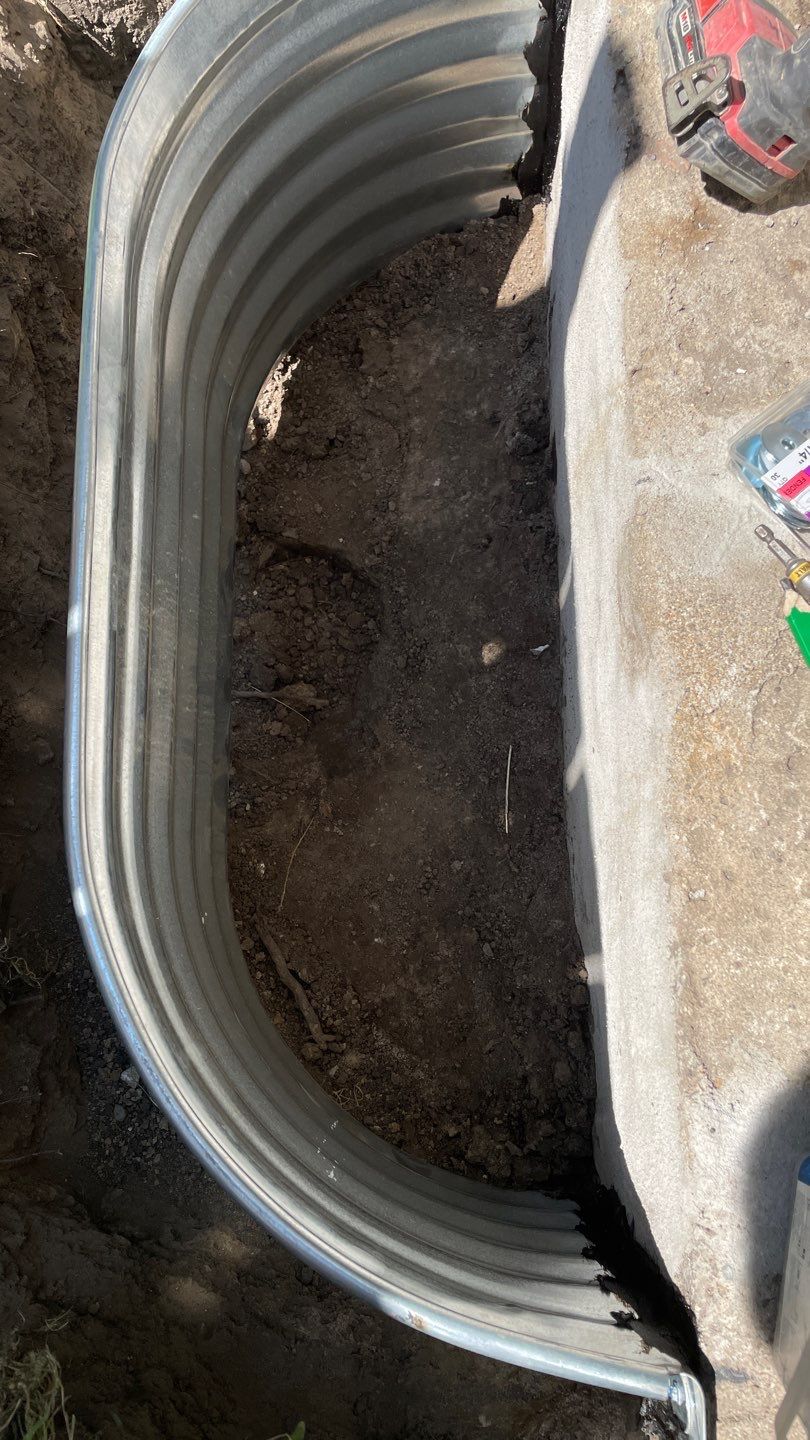 Drain Tile, Window Wells & Buried Discharge in Minneapolis by Waterproofing Northeast