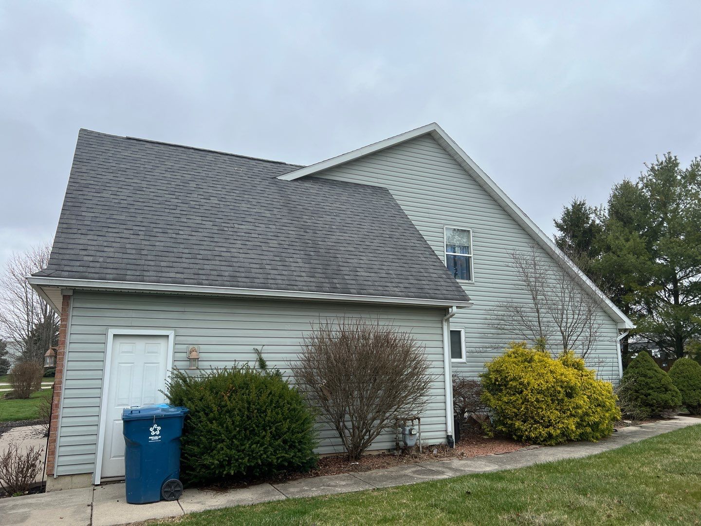 Exterior Installation using Onyx Black Durations and White Siding by WIW Enterprises Inc