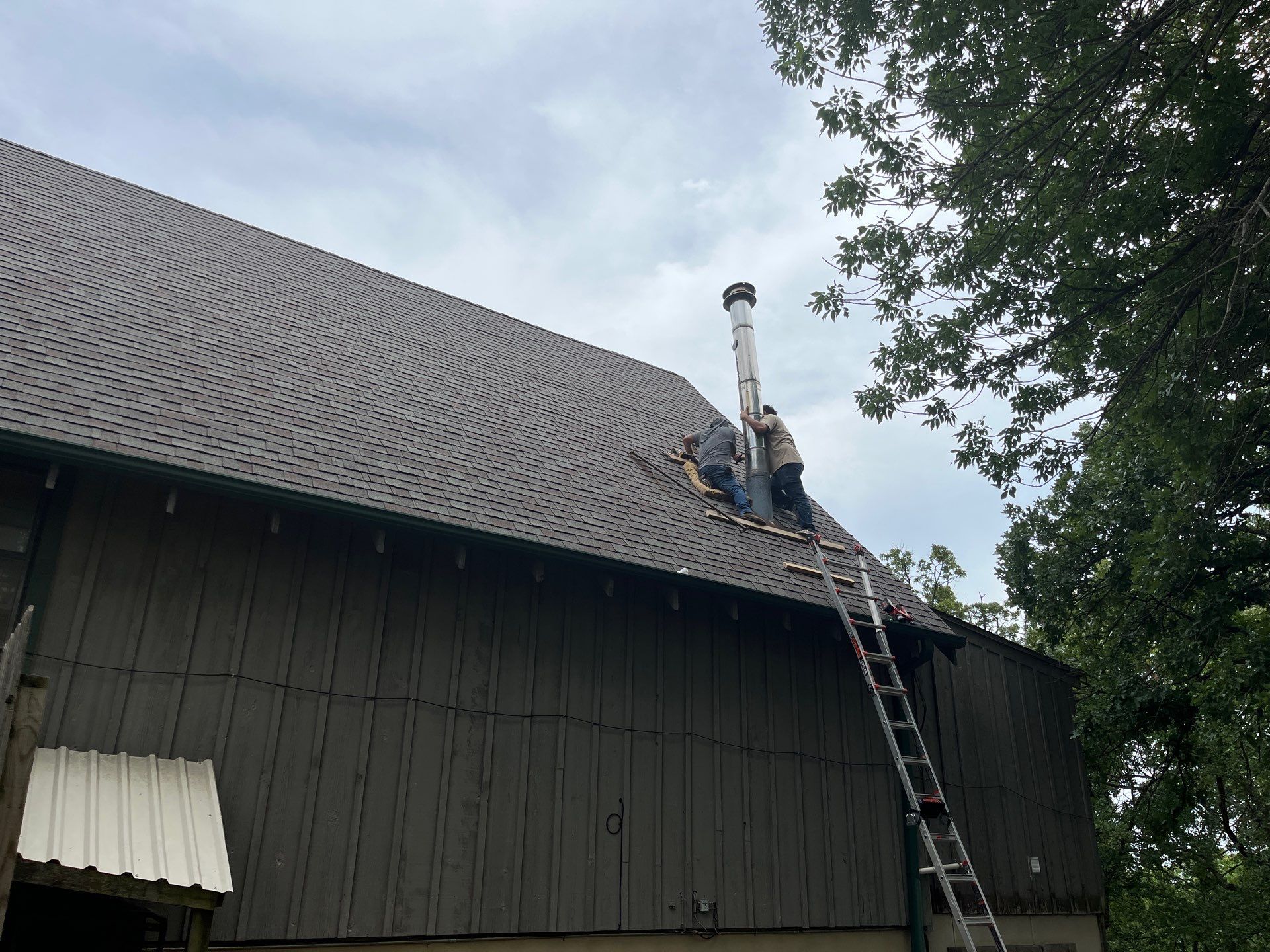 Architectural Shingle Roof Replacement and Skylight Installation in Sulphur by BANA Roofing and Solar Supply