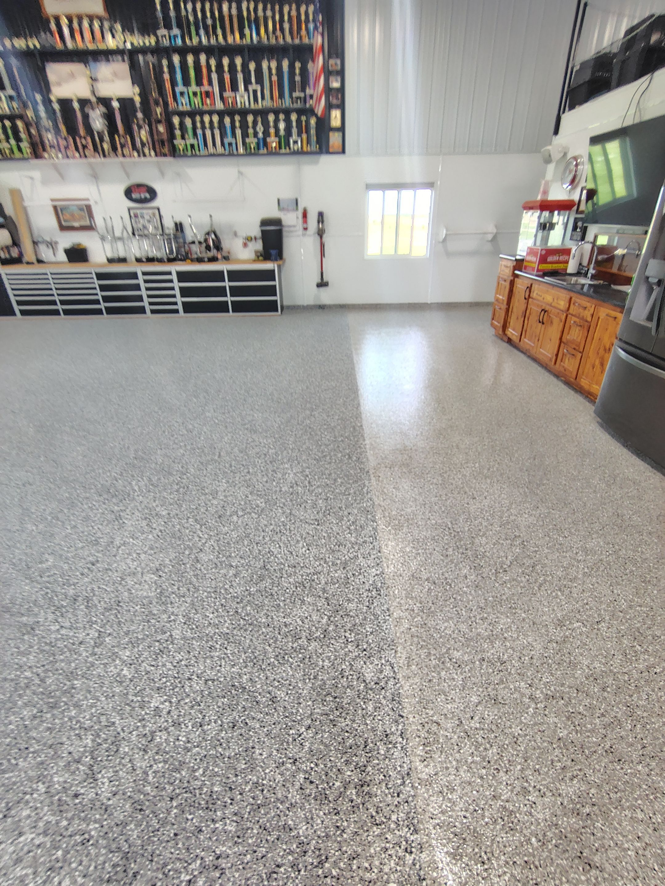 Multi-Stage Concrete Floor Coating for Egan Shop and RV Storage by Select Painting, Coatings & Garage Cabinets