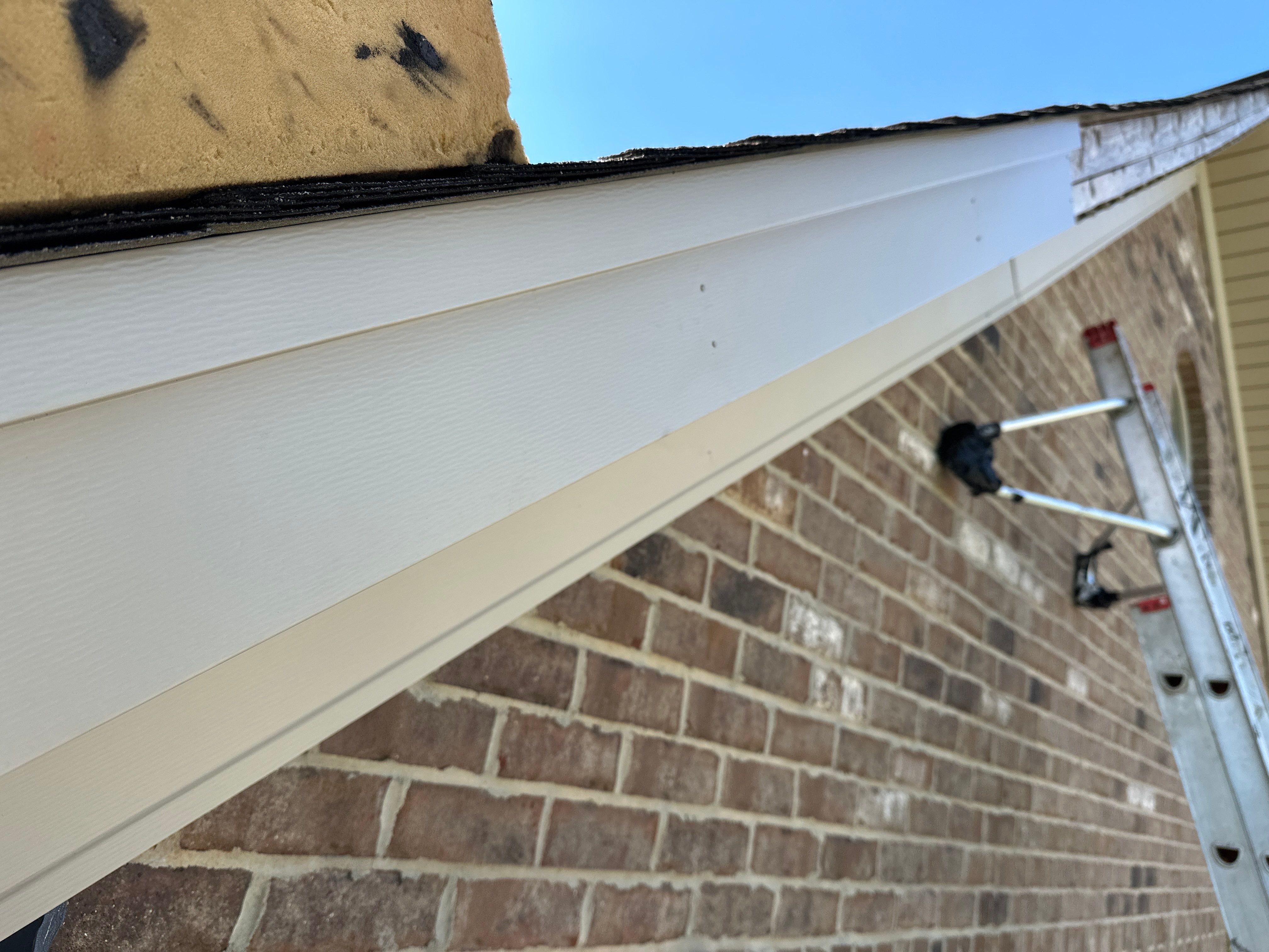 Replacing Wind Damaged Fascia Wrap by New Roof