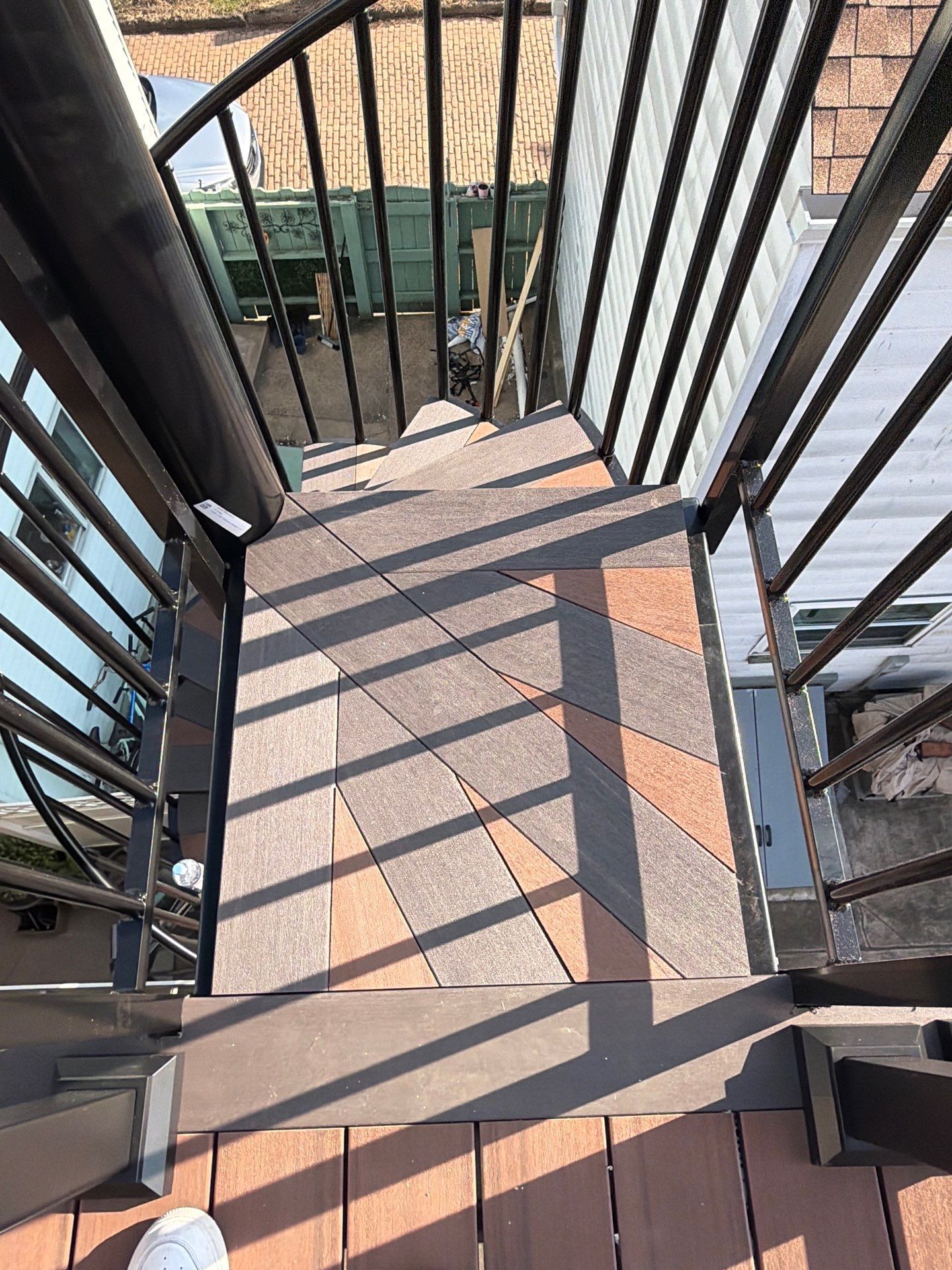 Elevated Multi-Level Composite Deck with Spiral Staircase in Pittsburgh by Cousins Roofing Siding & Decks