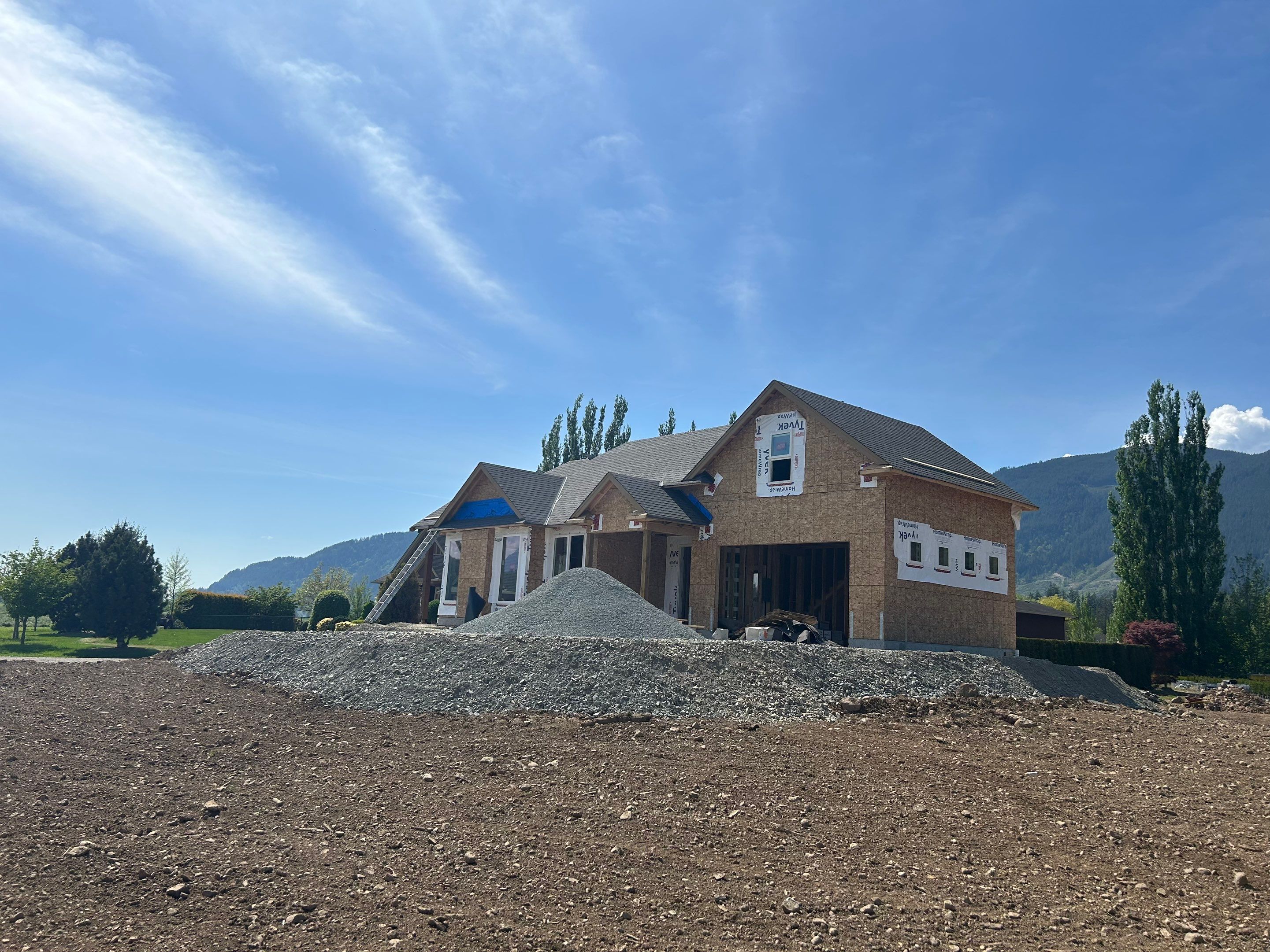 Residential Roofing Installation upgraded venting and hip and ridge capping by Top Notch Roofing Inc