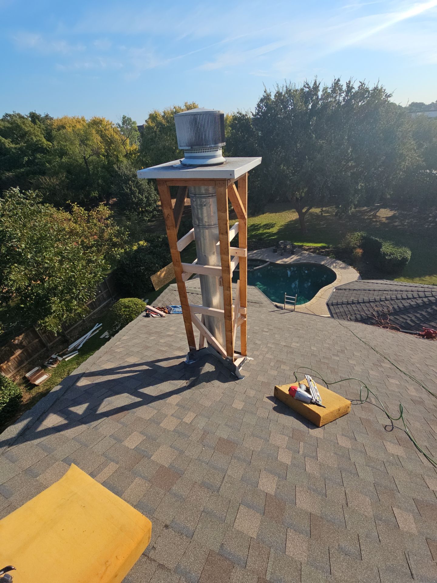 chimney repair using lap engineered treated composite siding. by road roofing llc