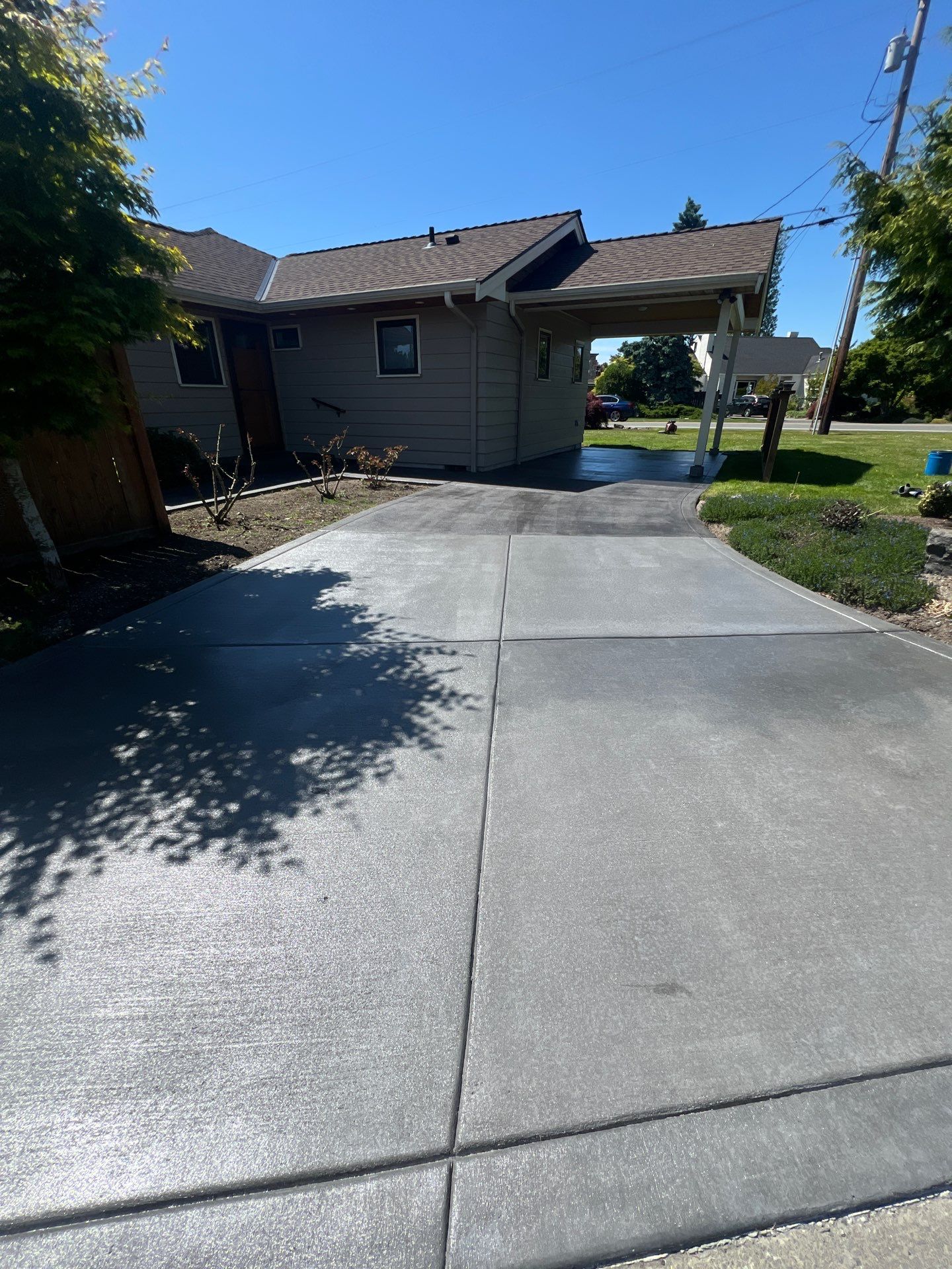 Colored Concrete Driveway Repair with Sealer| Everett    by Jireh Asphalt & Concrete Inc 