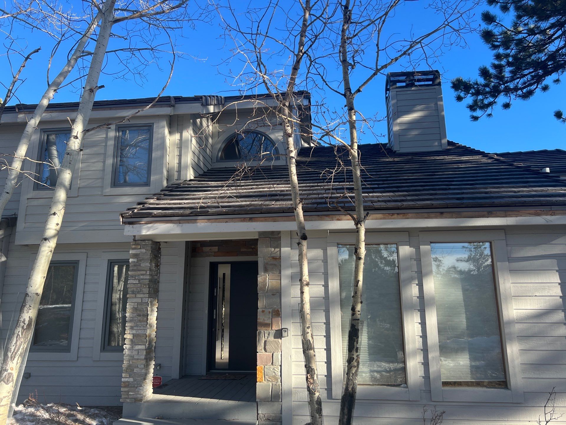 Residential Roofing Installation using Concrete Tile by Blue Peaks Roofing LLC 