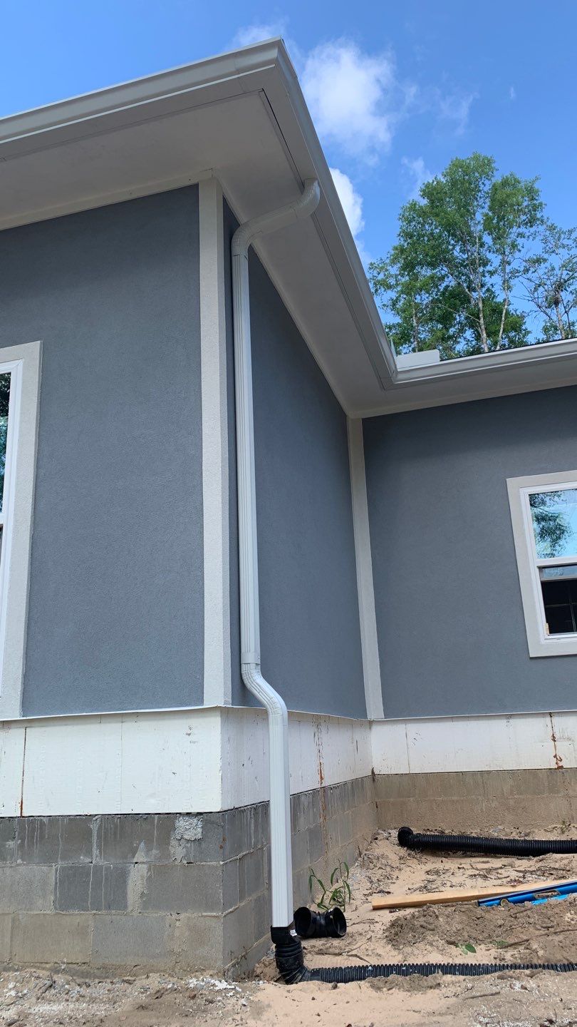 Seamless Aluminum Gutter Installation using 6 Inch Seamless Gutters in MIlton FL by Gutter Professors