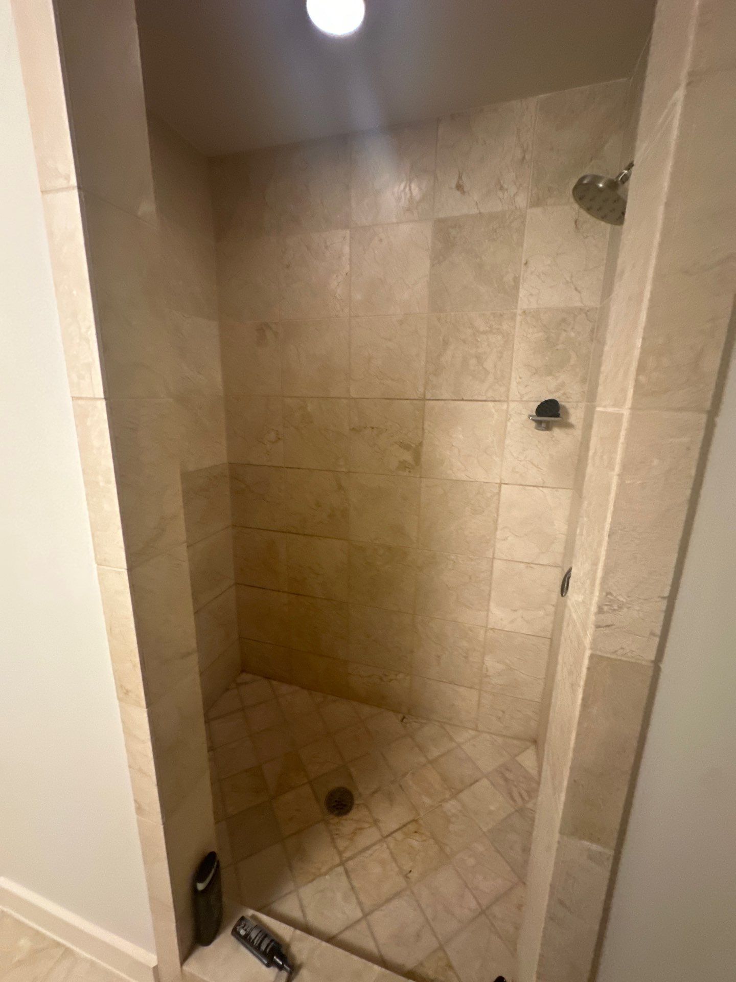 Modern Bathroom Transformation by Fine Line Flooring Inc.