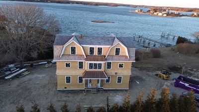 Great Island - Red Cedar Roofing, Yellow Cedar Siding, Standing Seam Copper, & Copper Gutters 