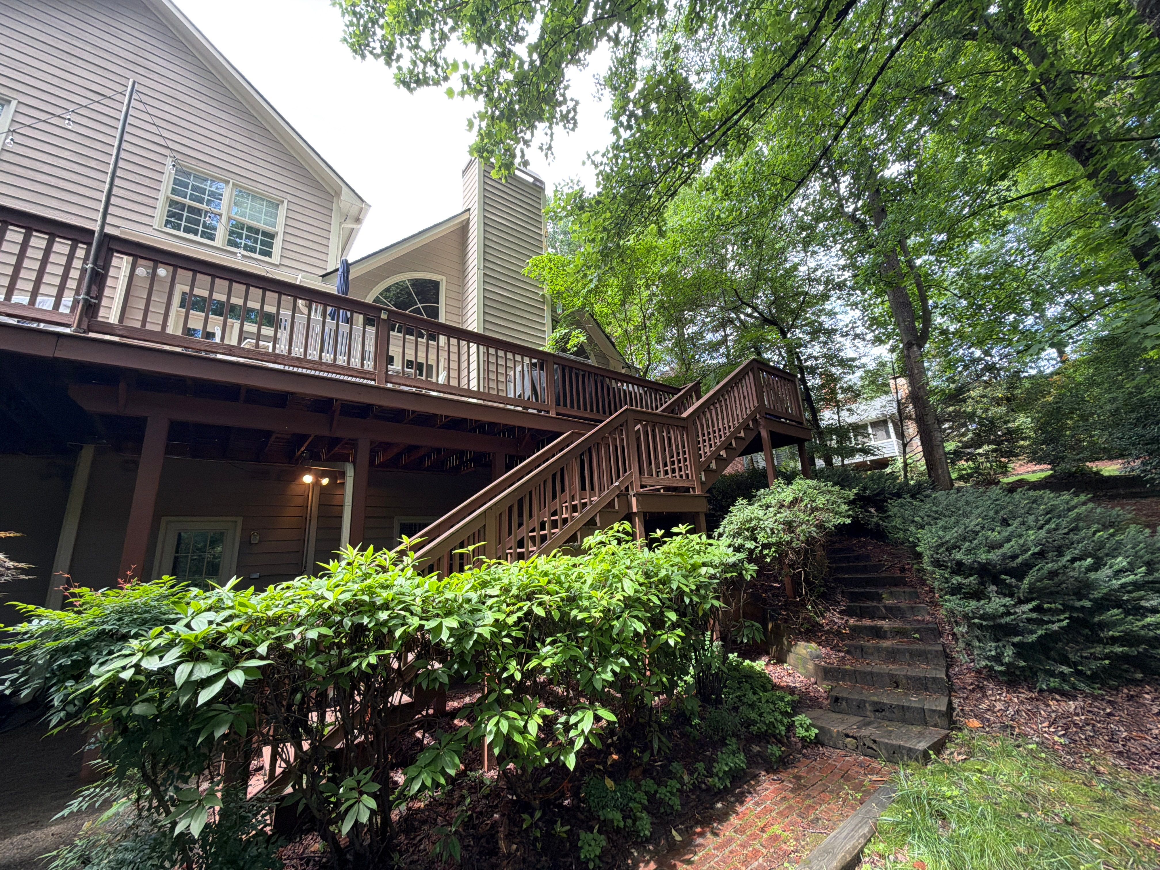 Full James Hardie Siding Replacement and Trex Deck Resurface in the Saddle Color by Nelson Exteriors 