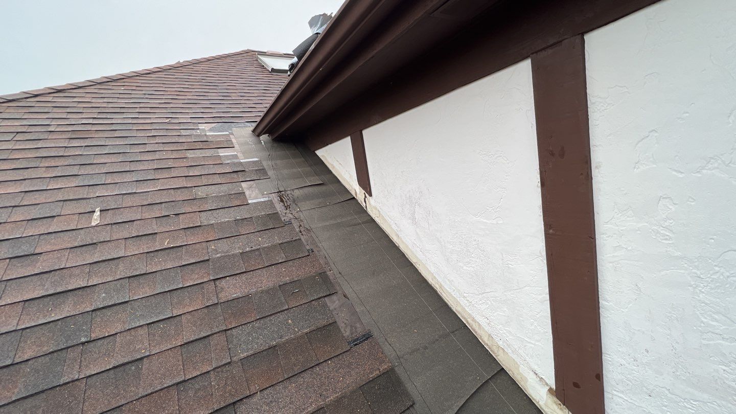 Step flashing repair on roof to wall by Pro Home Services Inc