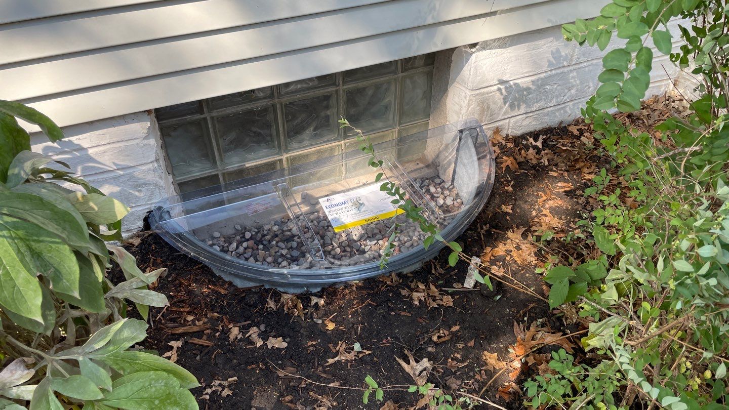 Drain Tile, Window Wells & Buried Discharge in Minneapolis by Waterproofing Northeast