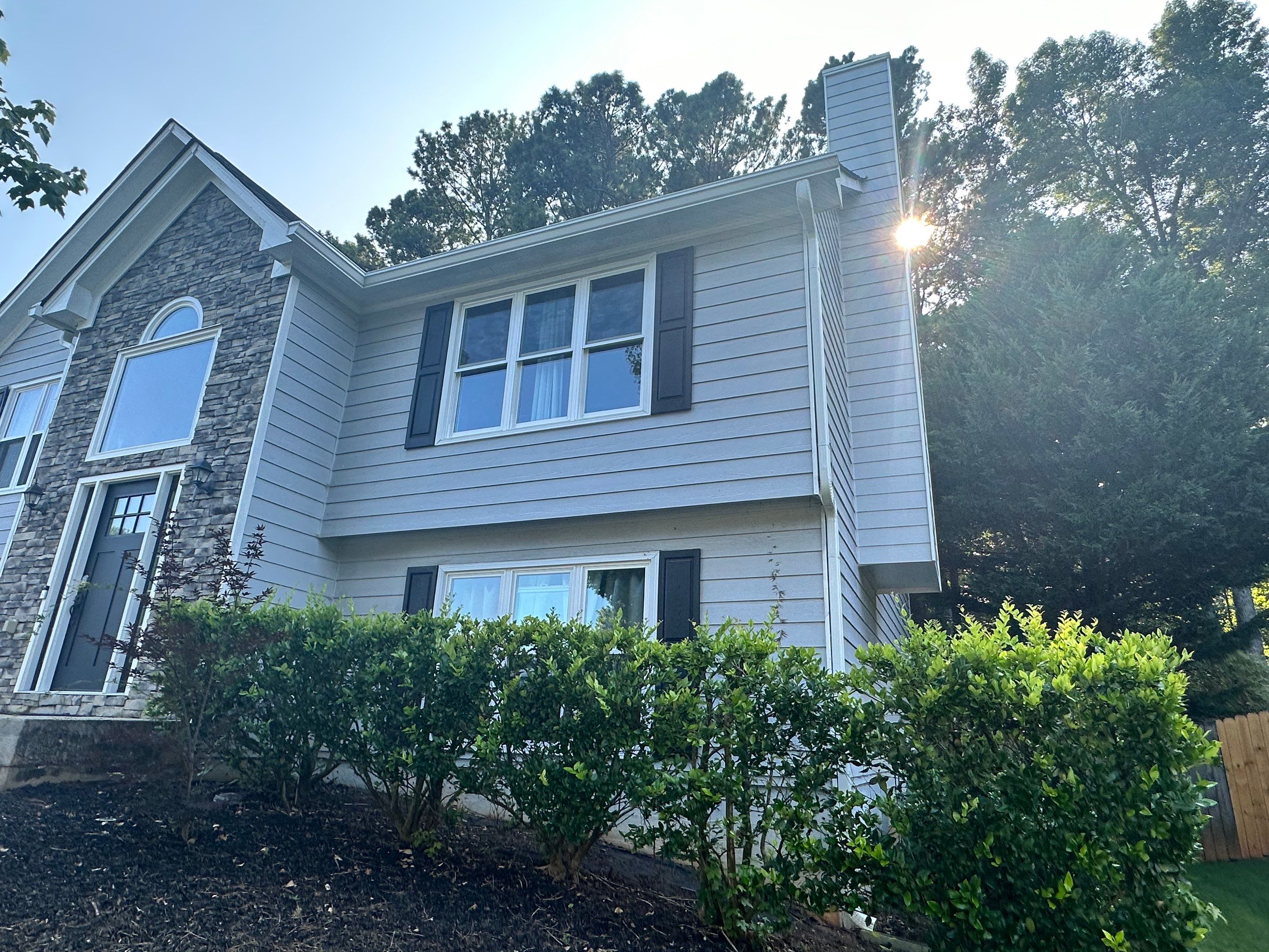 Gutter Replacement for a Two-Story Home in Woodstock by Swift Home Renovations