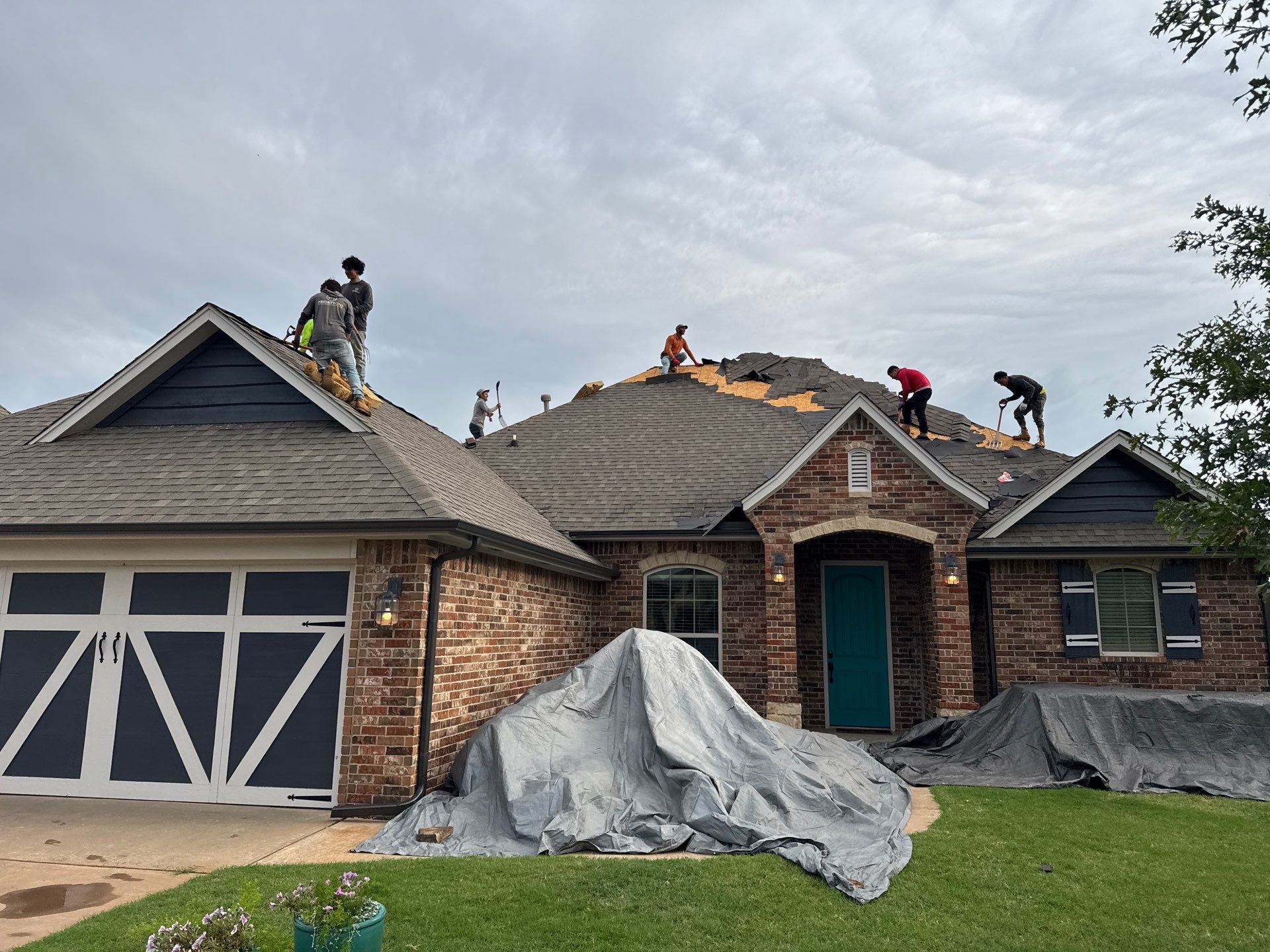GAF Architectural Shingle Roof Replacement and Decking Repair in Mustang by 5Coat Roofing & Construction