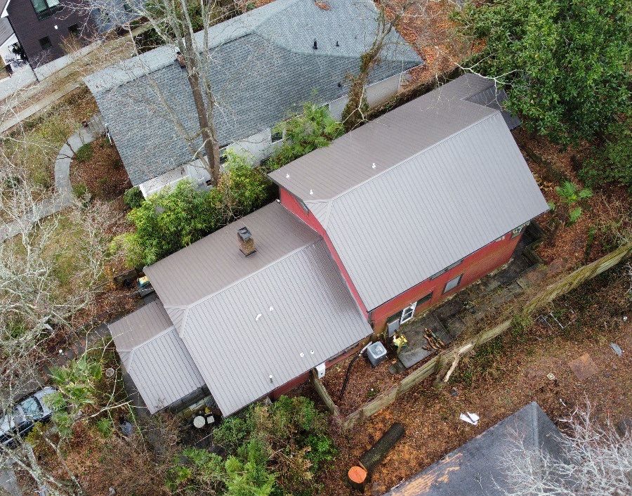 metal roof install by Nailed It Roofing & Remodeling LLC