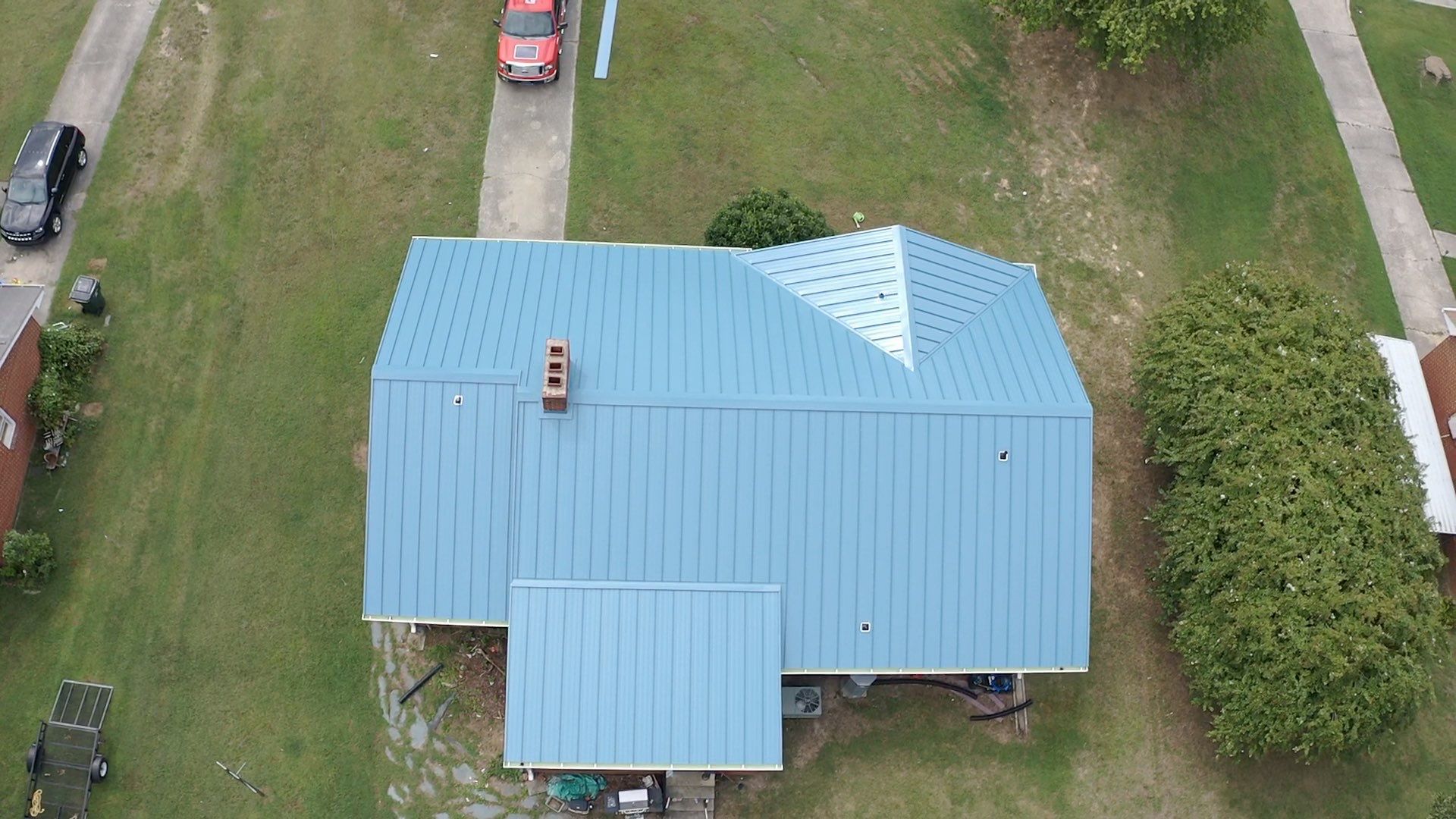 Carolina Blue Standing Seam Roof by Just In Time Roofing and Restoration