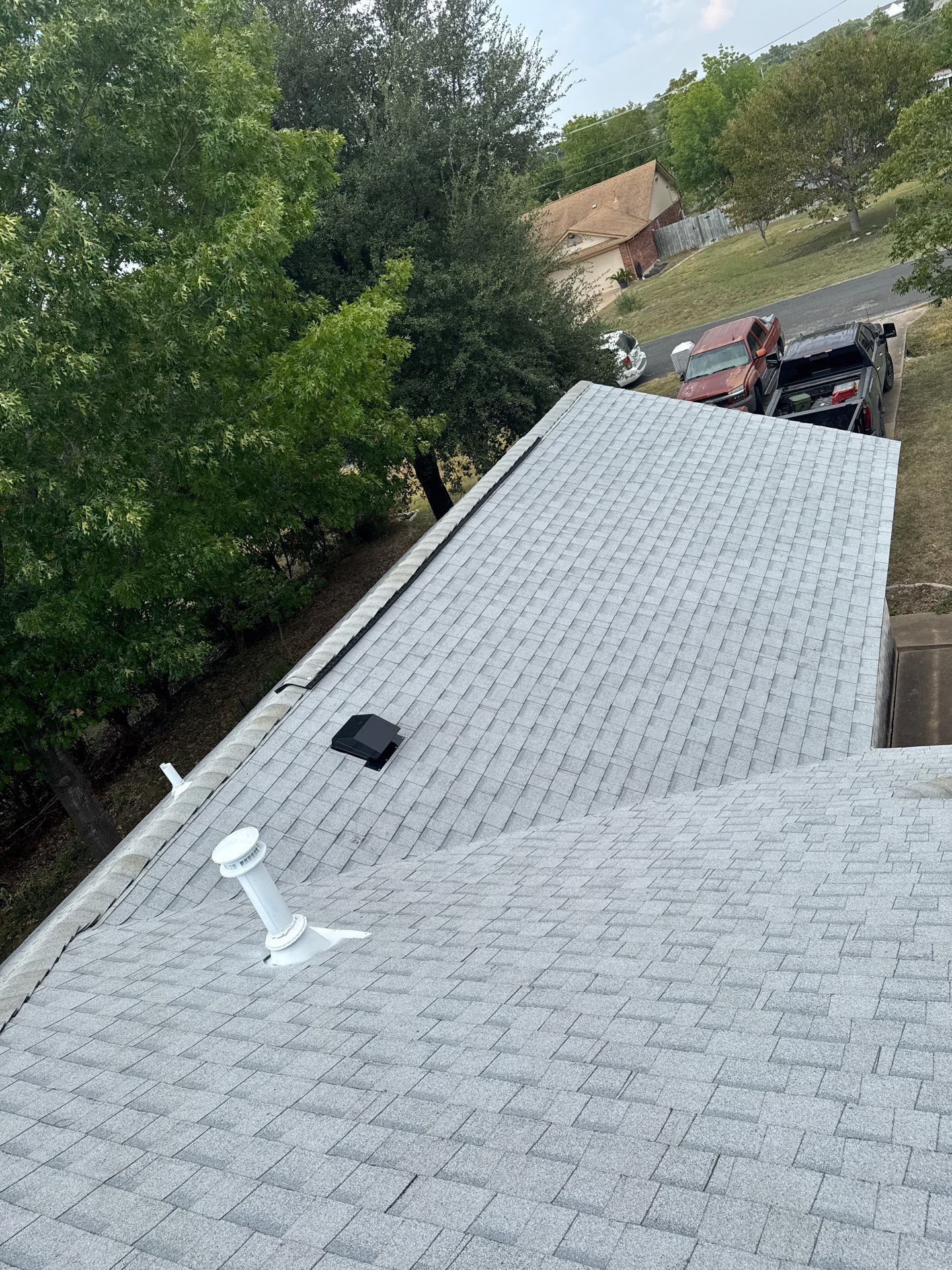 Residential Roof Replacement using Owens Corning - Duration - Shasta White by Action Exteriors Austin