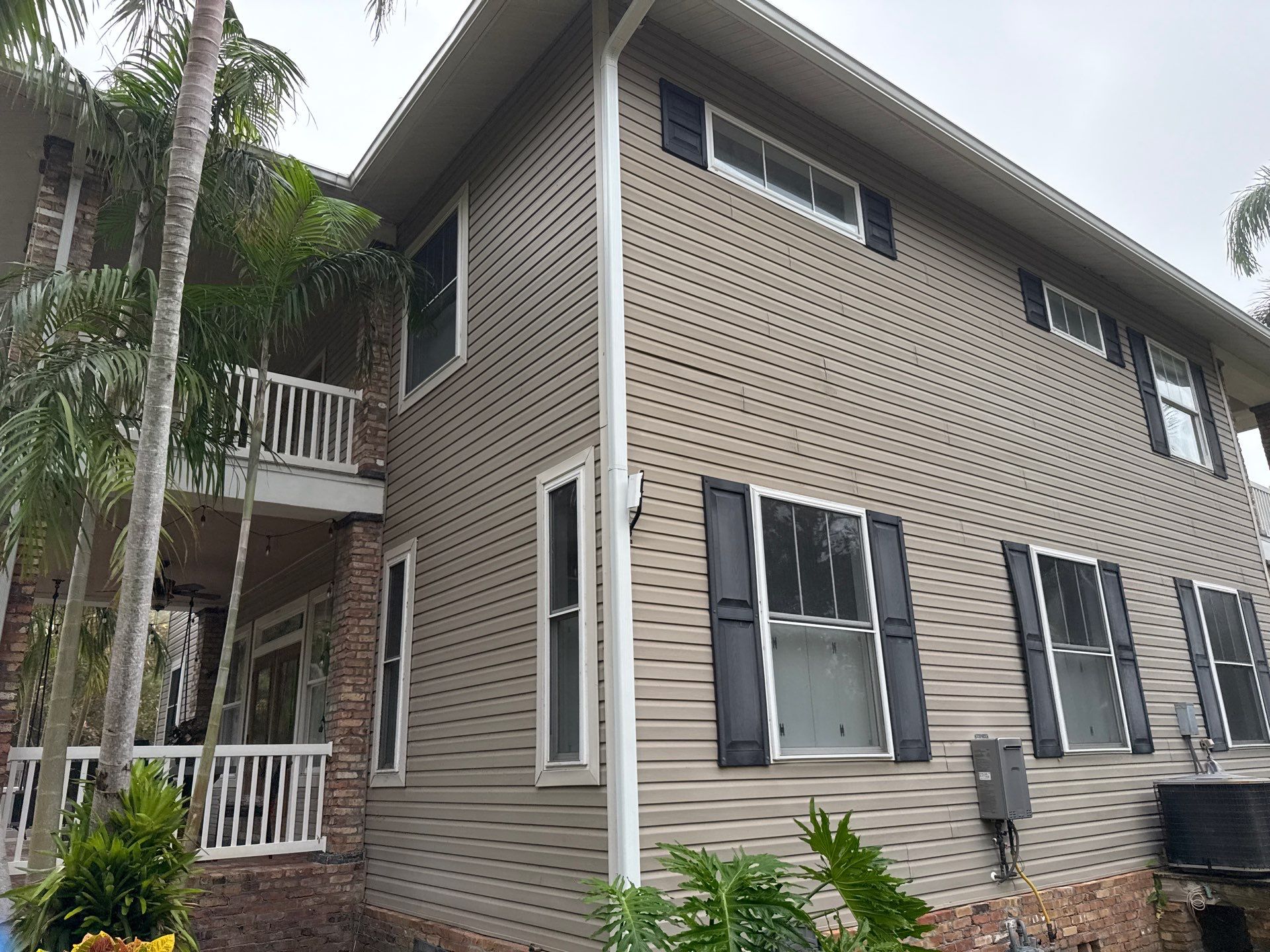 2-Story House Wash and Garage Pressure Washing in Palmetto, FL by Sunshine AquaWash