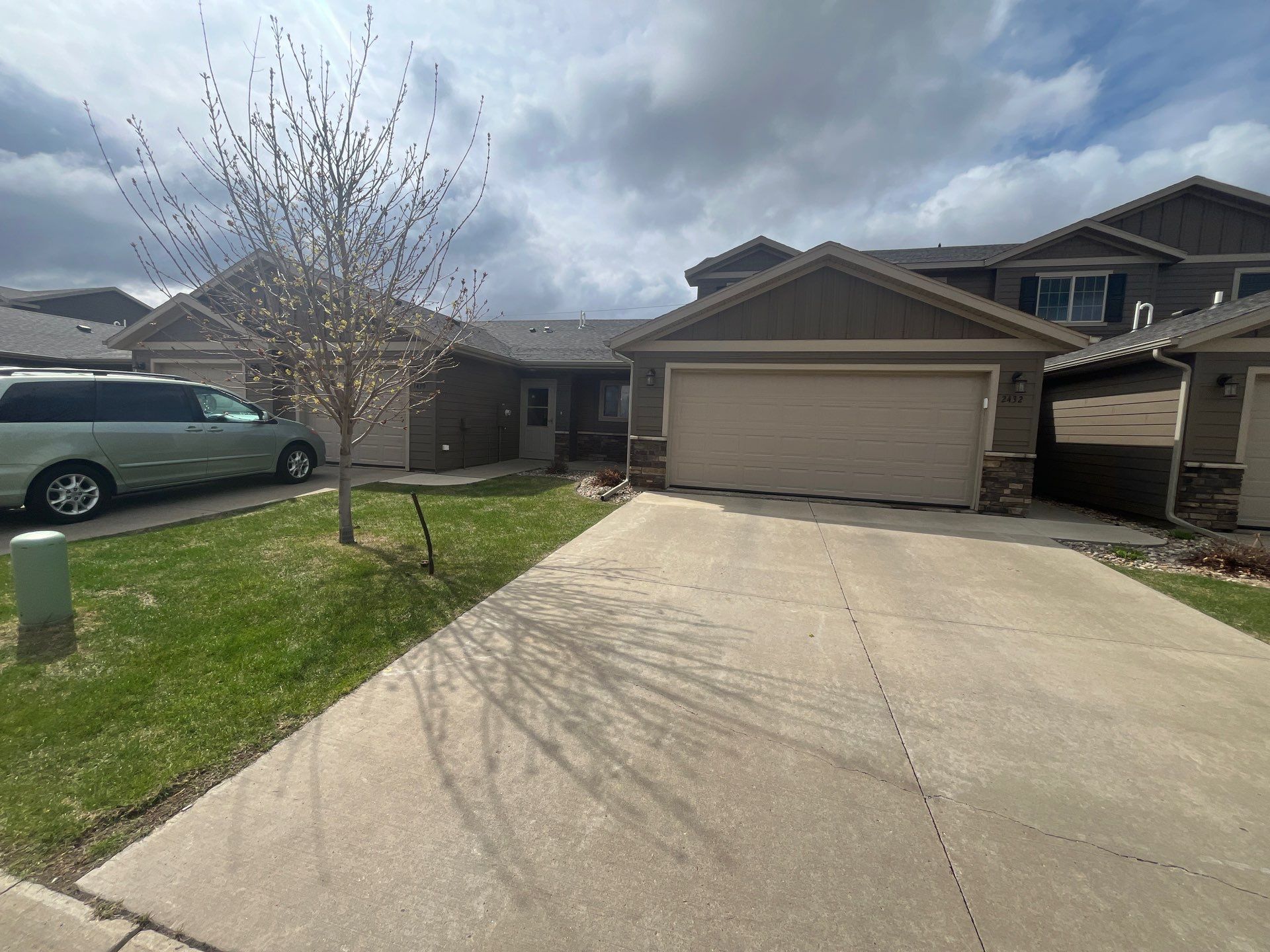 Exterior Painting for Multi-Unit Townhomes in Sioux Falls by Select Painting, Coatings & Garage Cabinets