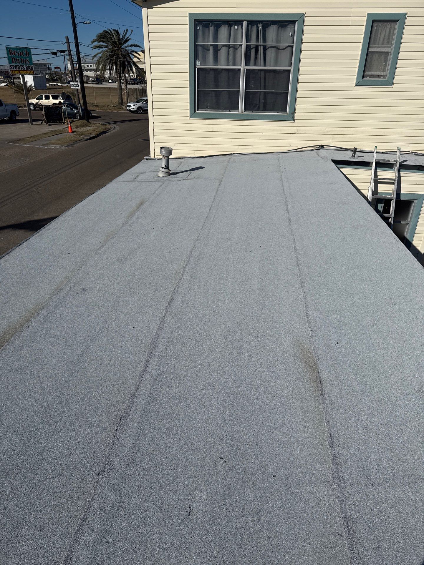 Mustang Island Flat Top by Bayfront Roofing and Construction