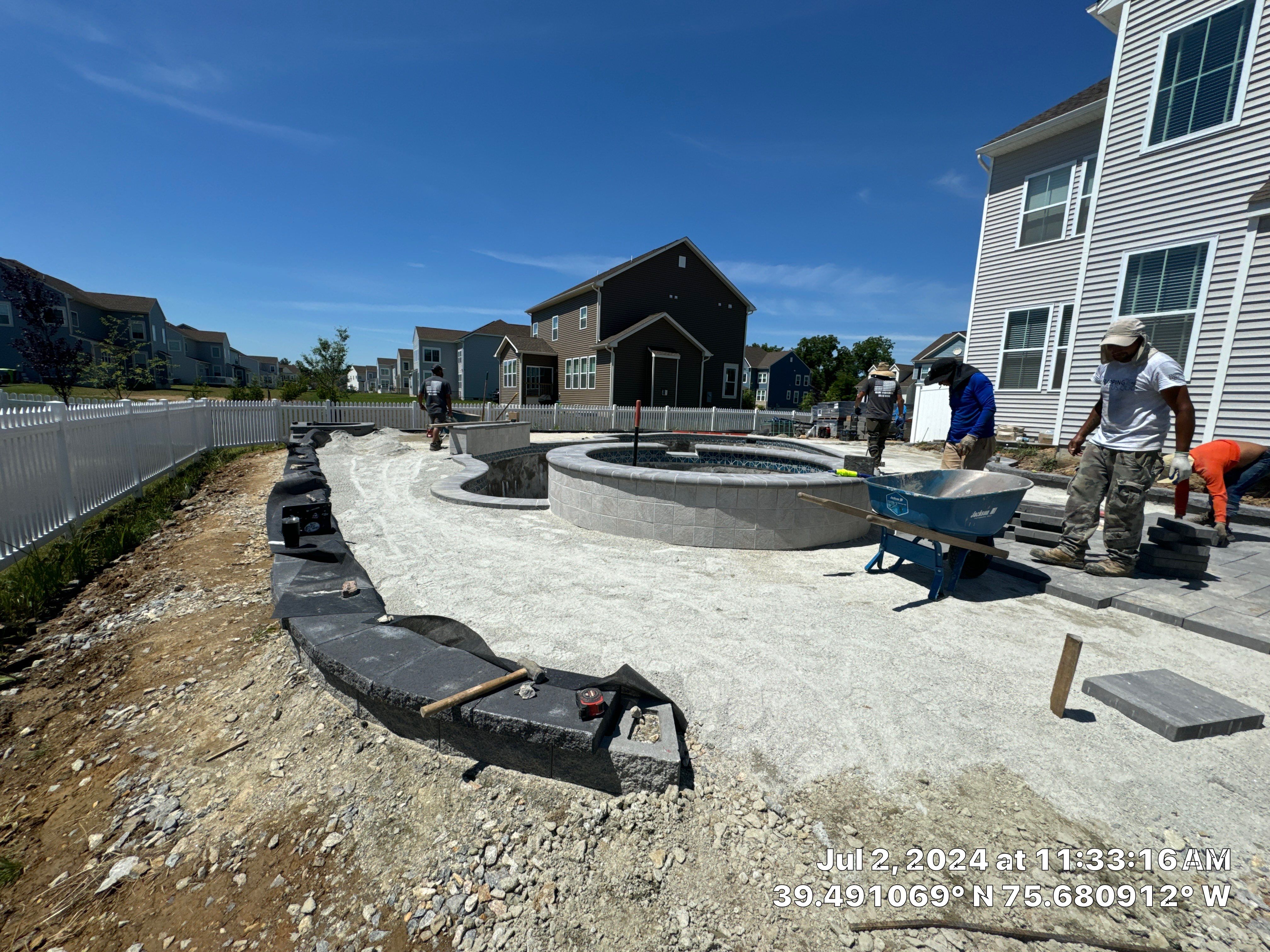 Pool and Hardscape Design in Delaware | Belgard Paver Patio & Outdoor Living Space by Studio G Indoor Spaces & Outdoor Living