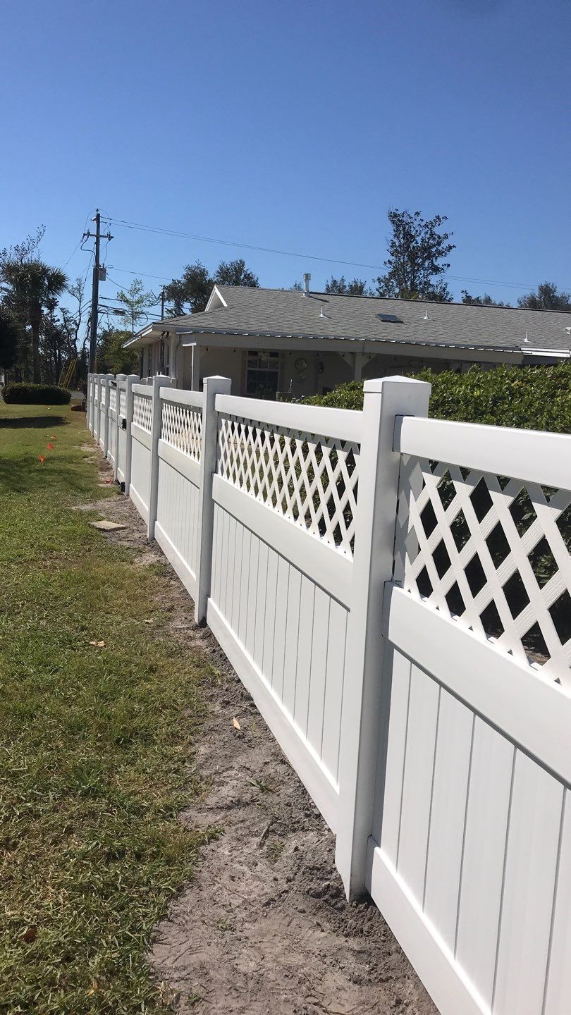 Fence Installation using White Vinyl by Hip Square Fence Inc.