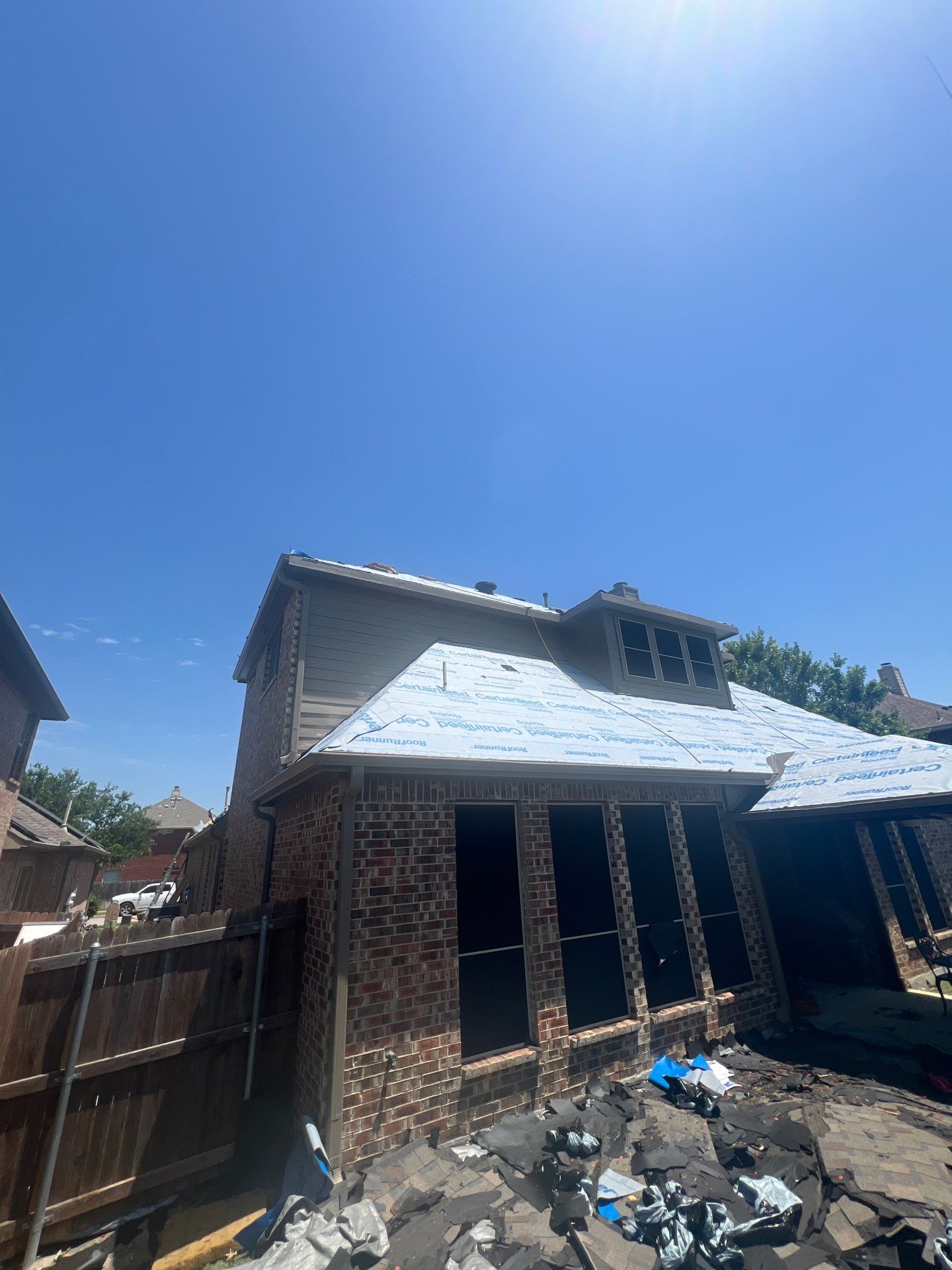 Roof, Gutters, Screens, and Fence Staining by Rainy Day Restoration