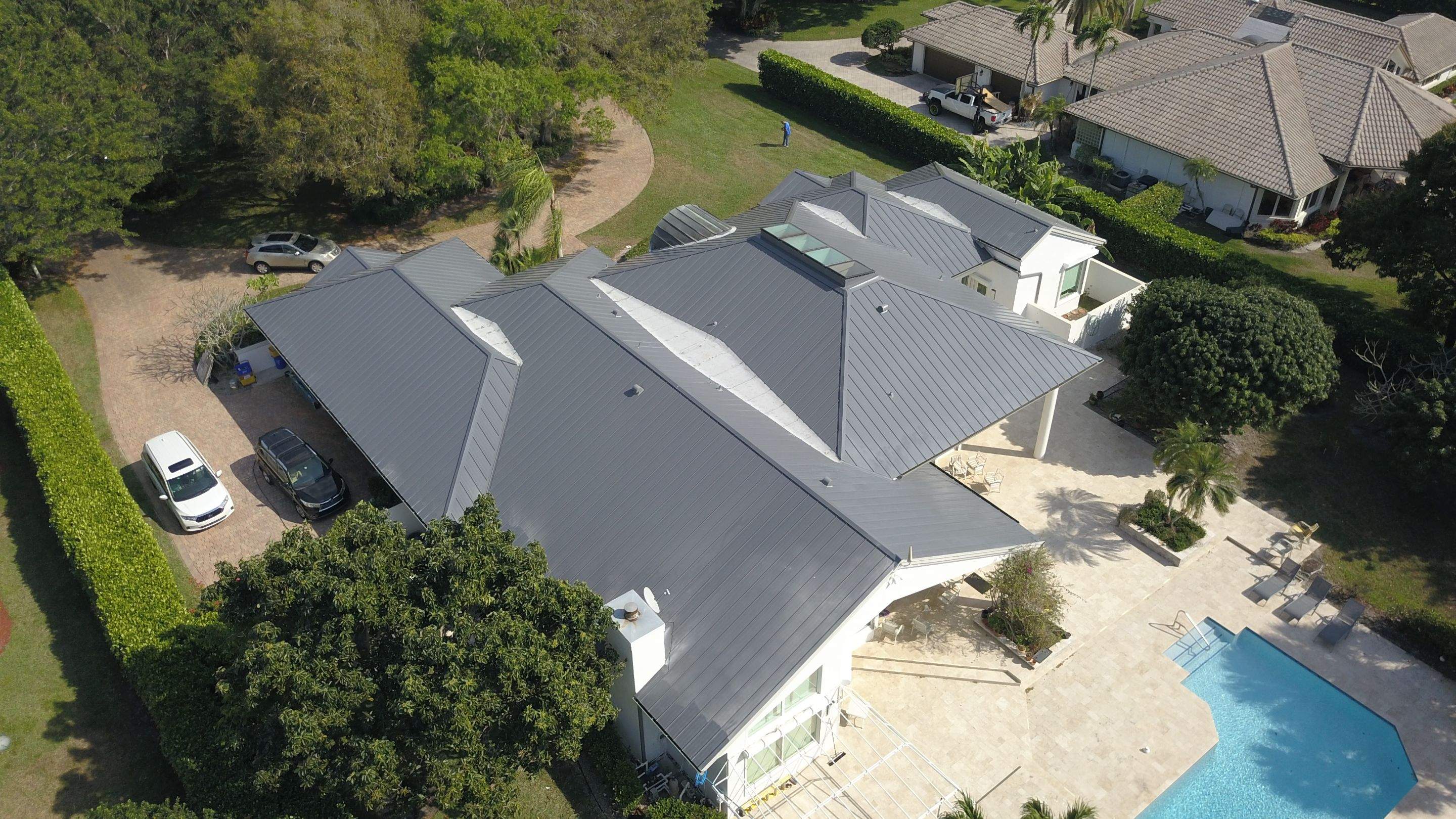 Residential Roofing Installation using 1" Nail strip metal roof by BLUES BROTHERS ROOFING