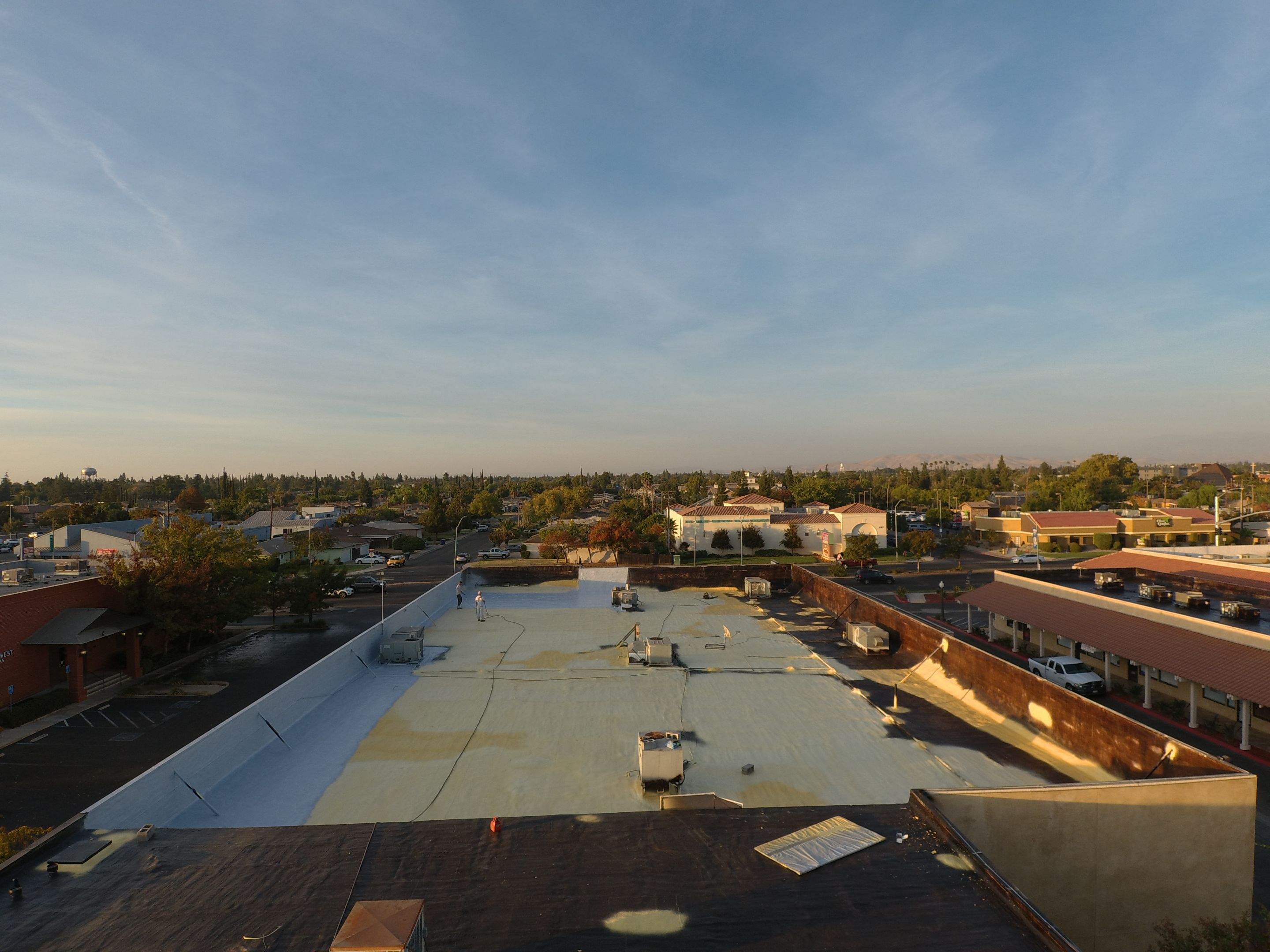 Reburbish existing spray foam job by Straight Edge Roofing Inc