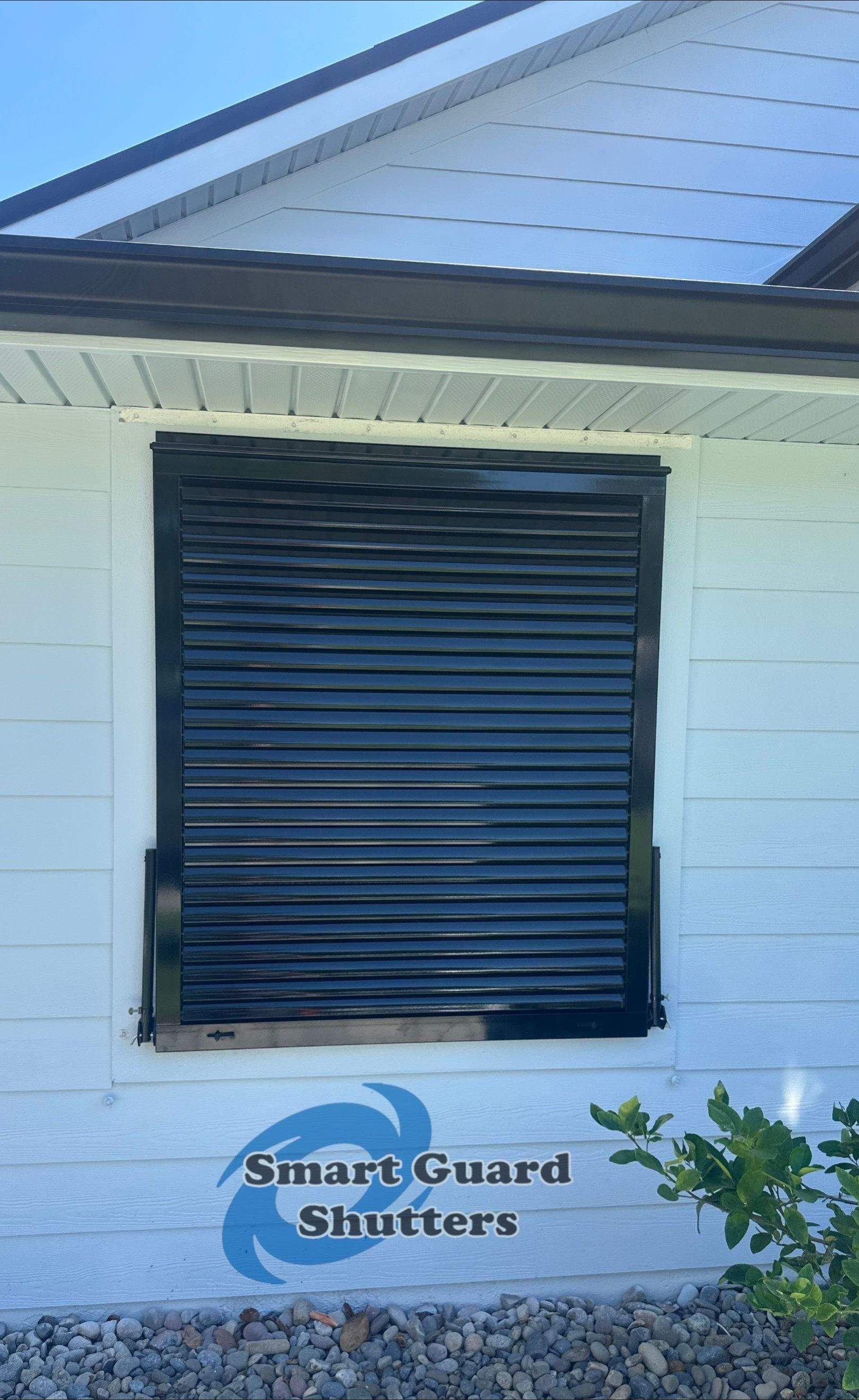 Impact Bahama Shutters in Jet Black by Smart Guard Shutters