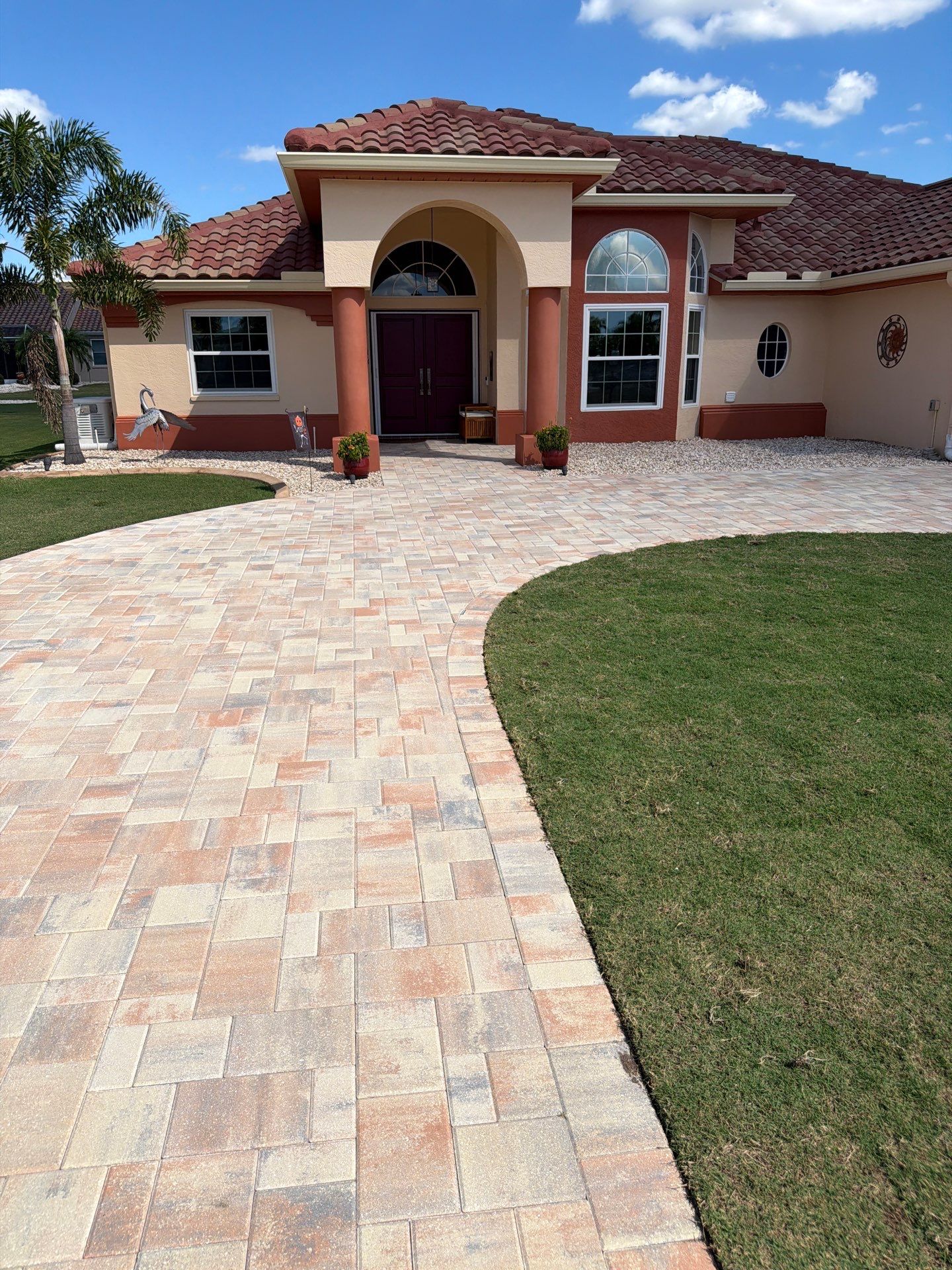 Professional Paver Sealing for this beautiful Driveway in Sun City Center by Supreme Paver Experts