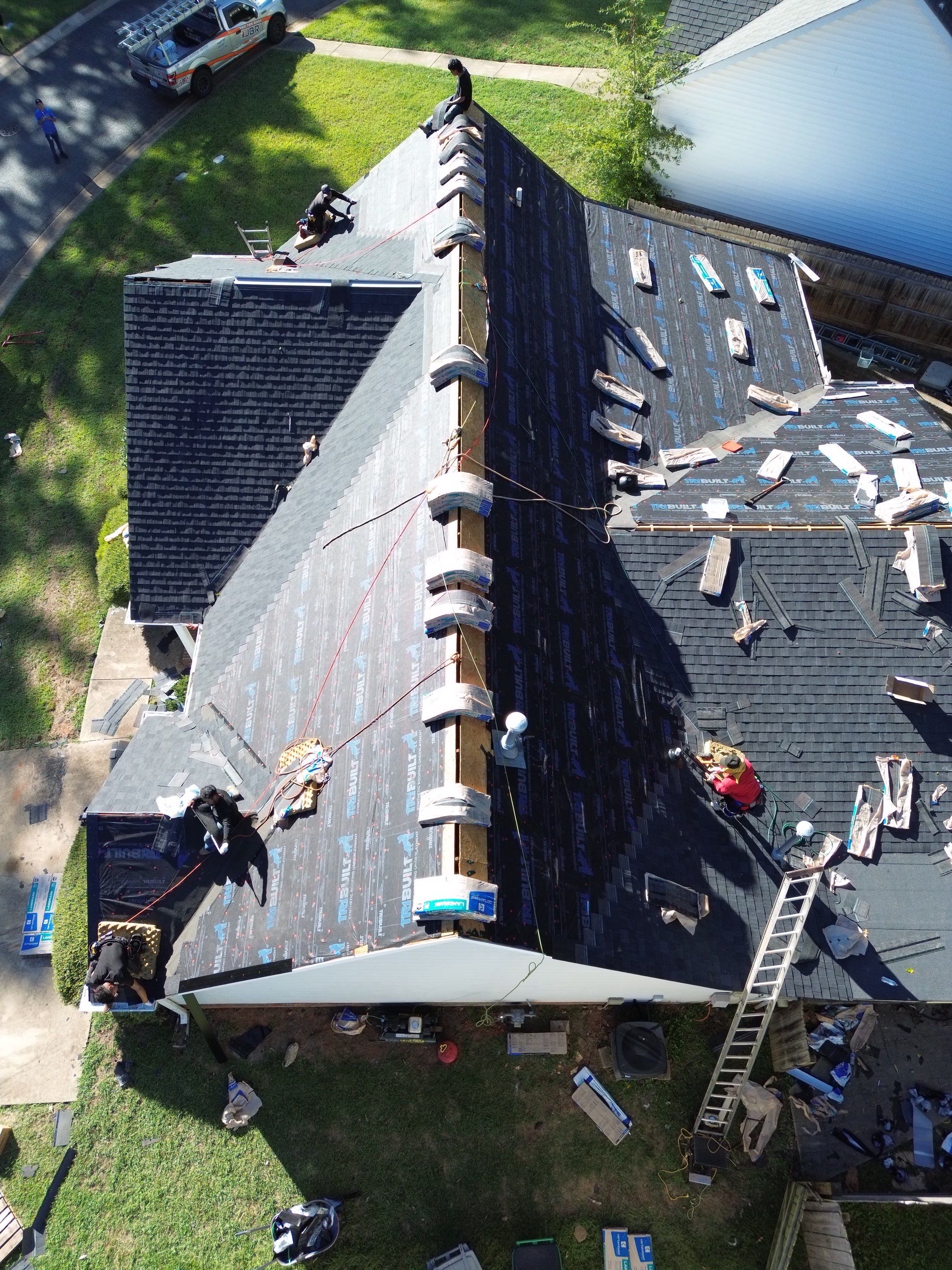 Roof and gutter replacement by hail and wind damage by Just Brilliant Restoration JBR