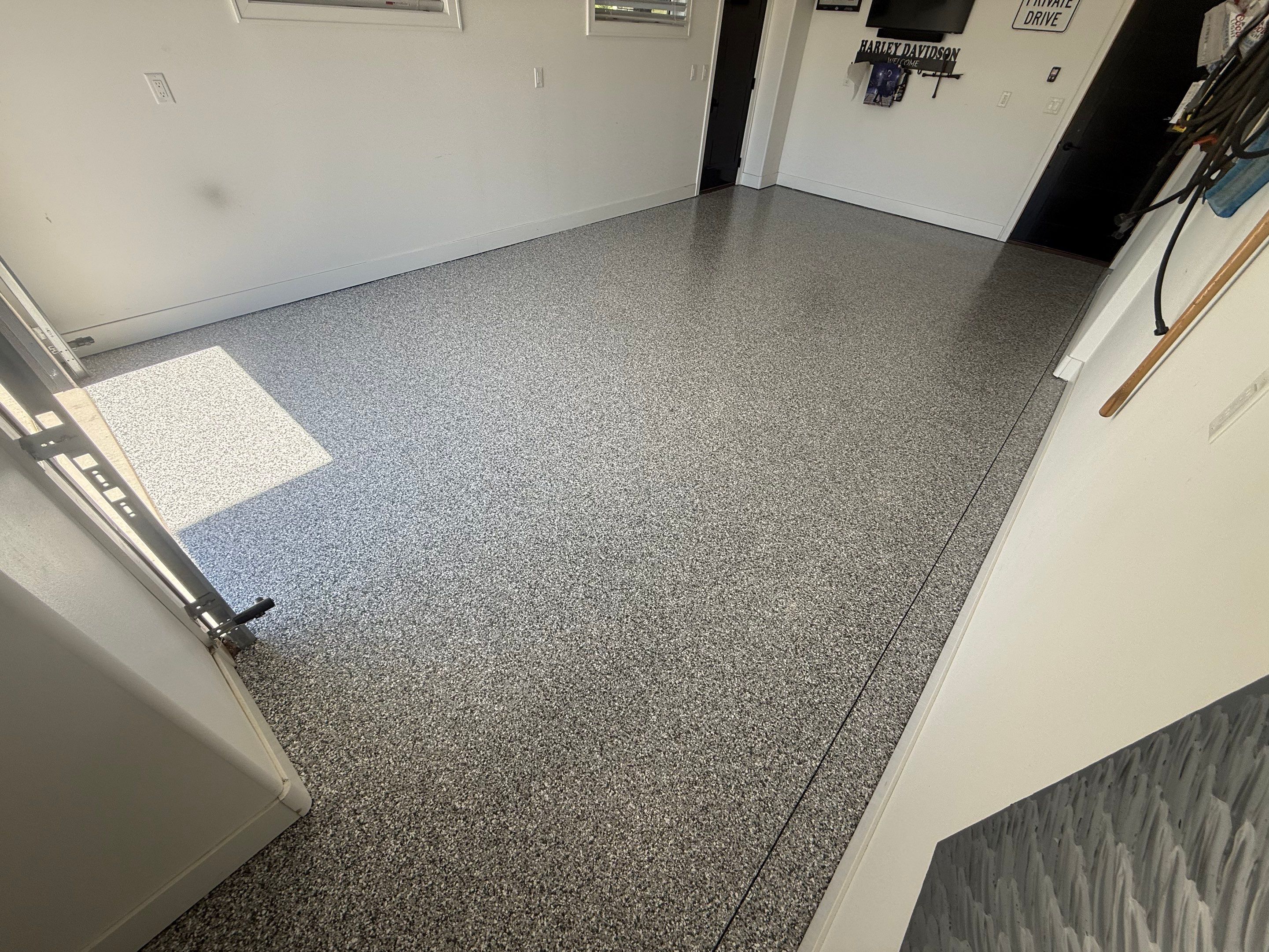 Gravel Flake Garage Floor Coating in Yankton by Select Painting, Coatings & Garage Cabinets
