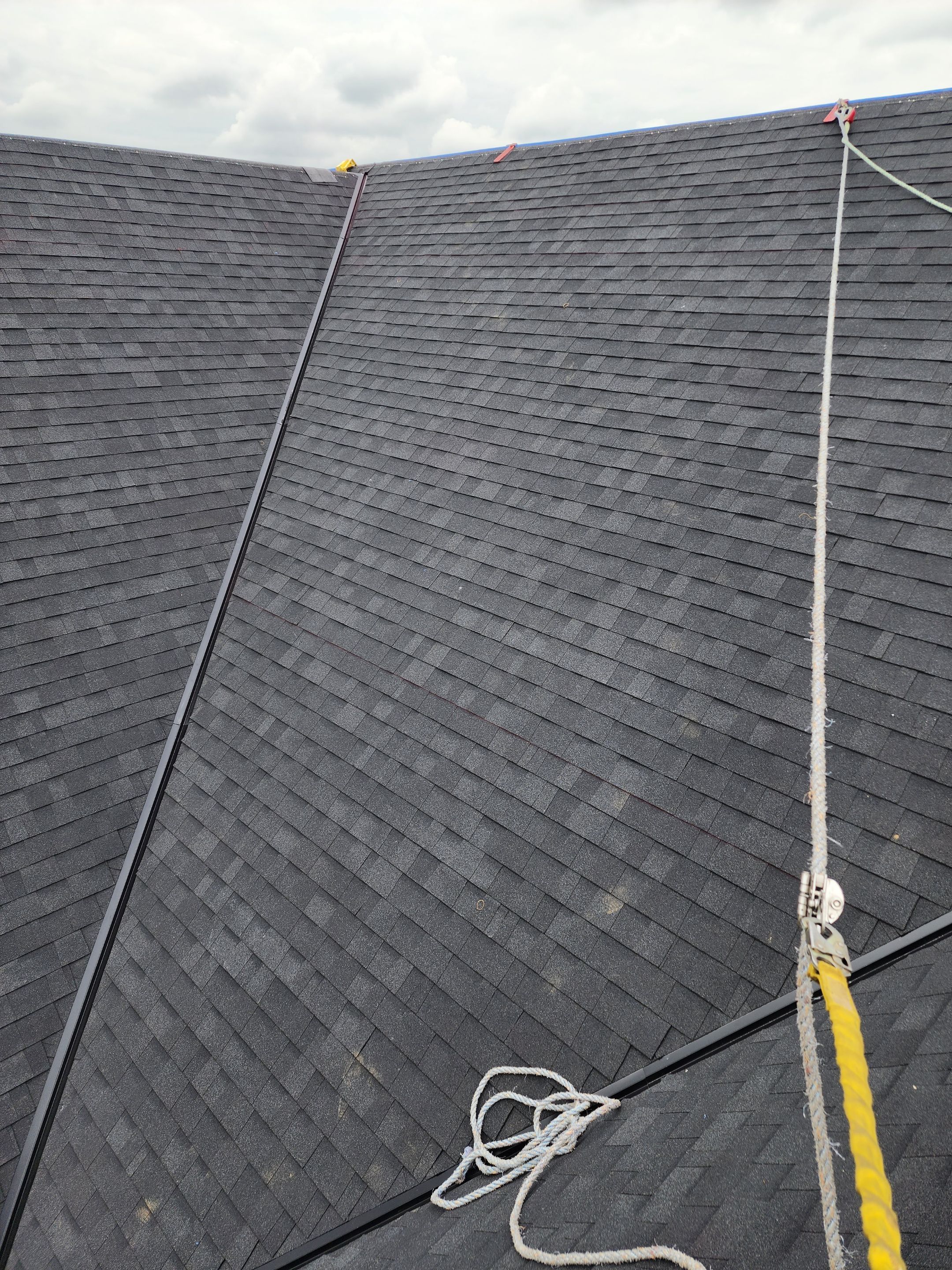 Residential Roofing Installation using OC Oakridge shingles by Top Notch Roofing Inc