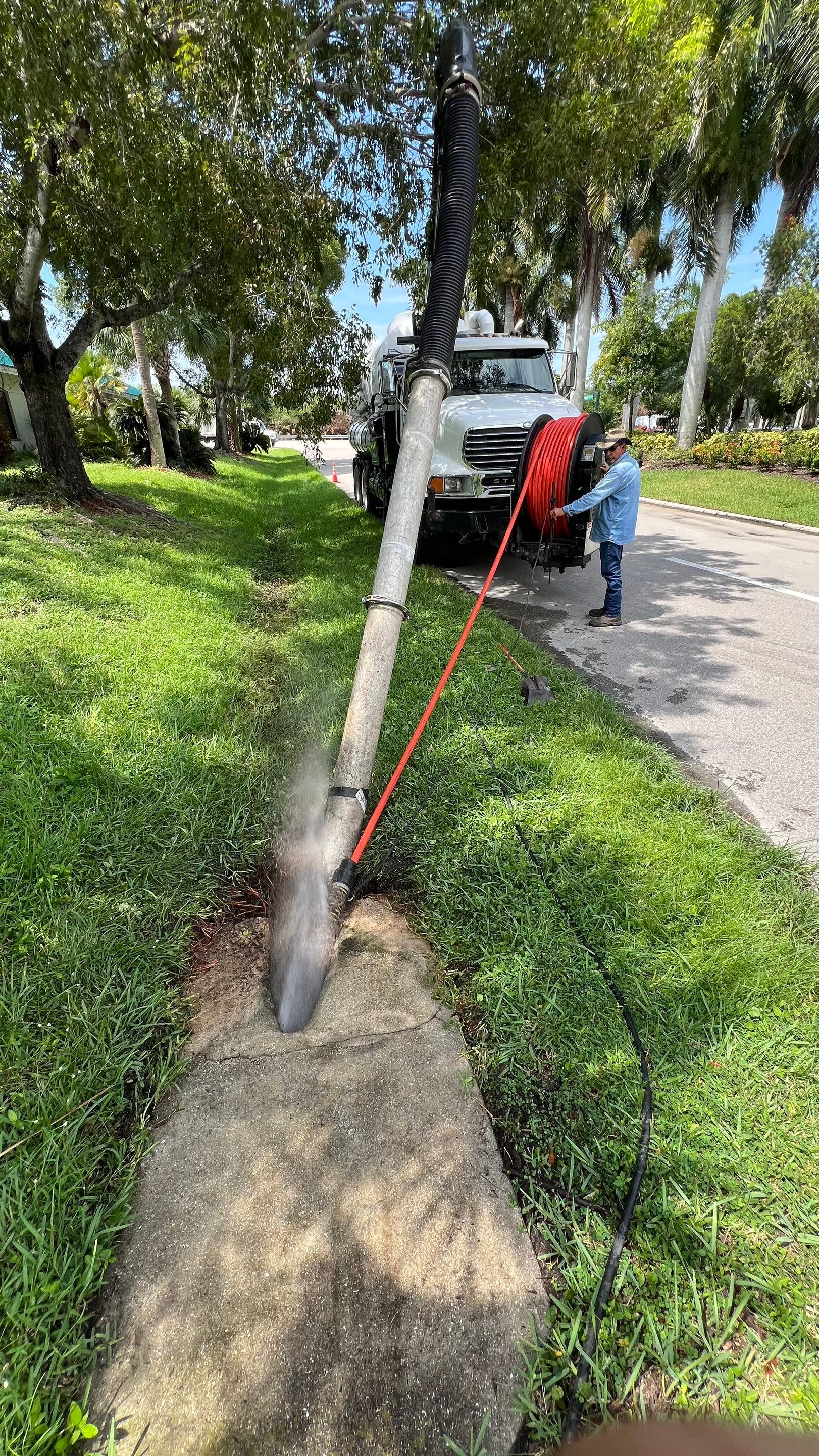 Naples Community Entry Road Stormwater System Cleaning by APS Power & Water