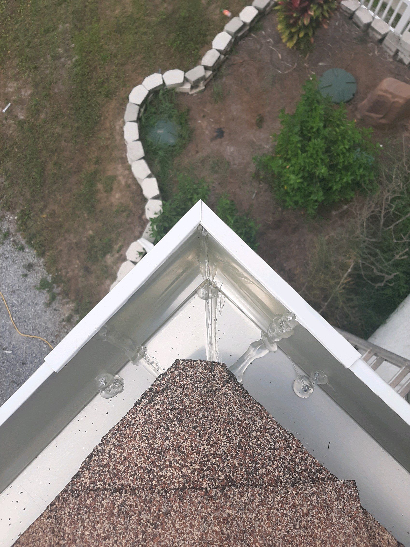 Seamless Gutter Installation using White K-Style Gutters by Gutter Professors