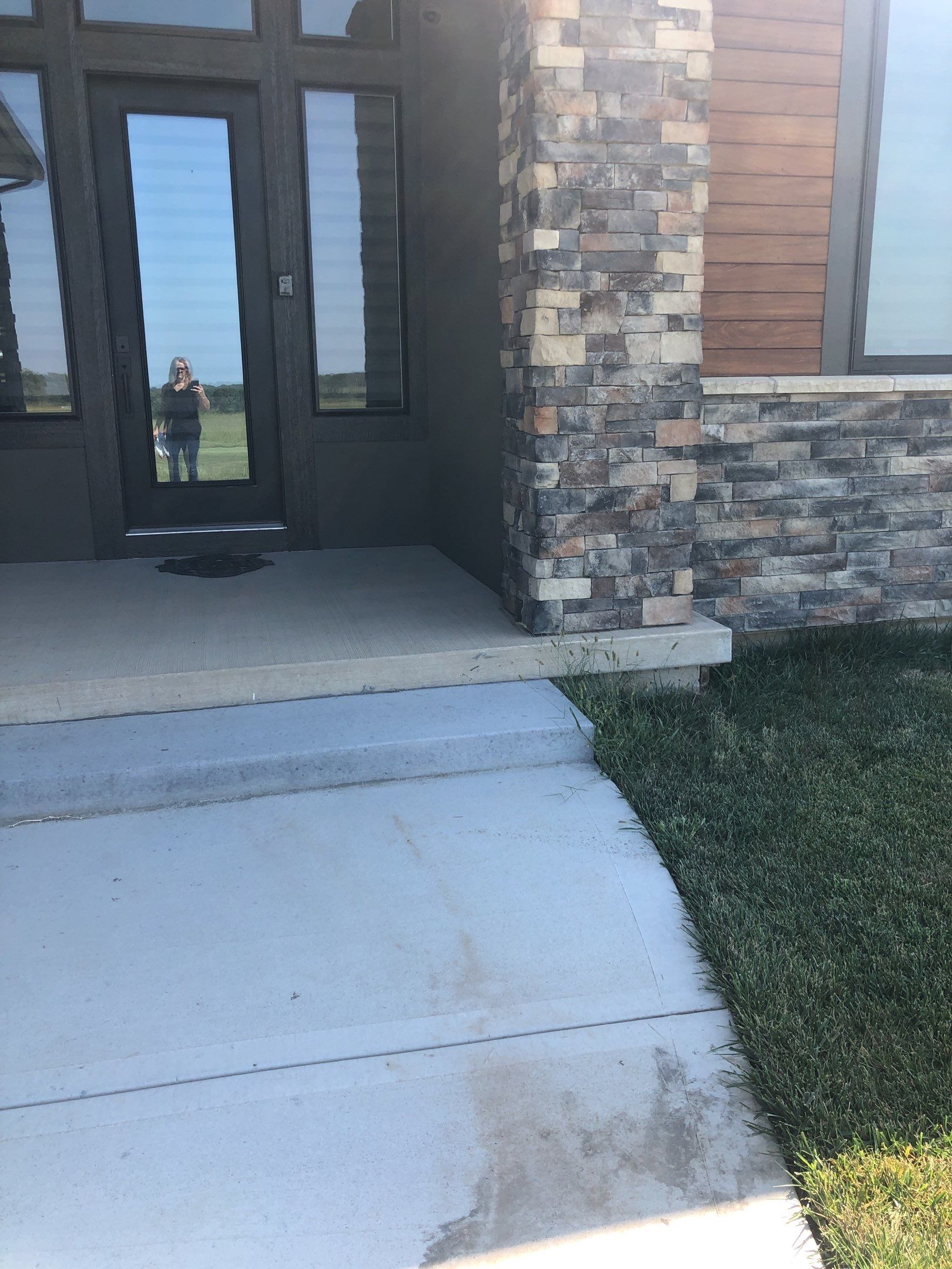 Olathe, KS -- Stoop/Sidewalk Tuscan Overlay by Big Red Decorative Concrete, LLC