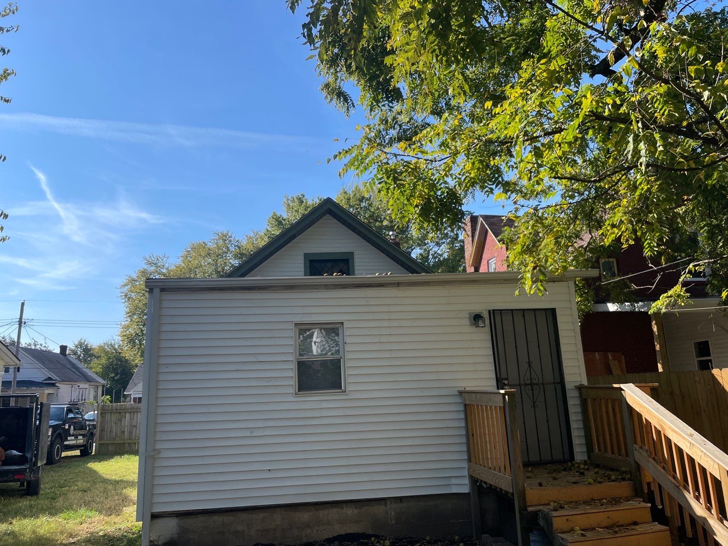 Rental Property Restoration, siding, flooring, gutters, landscaping by Storm Contracting 
