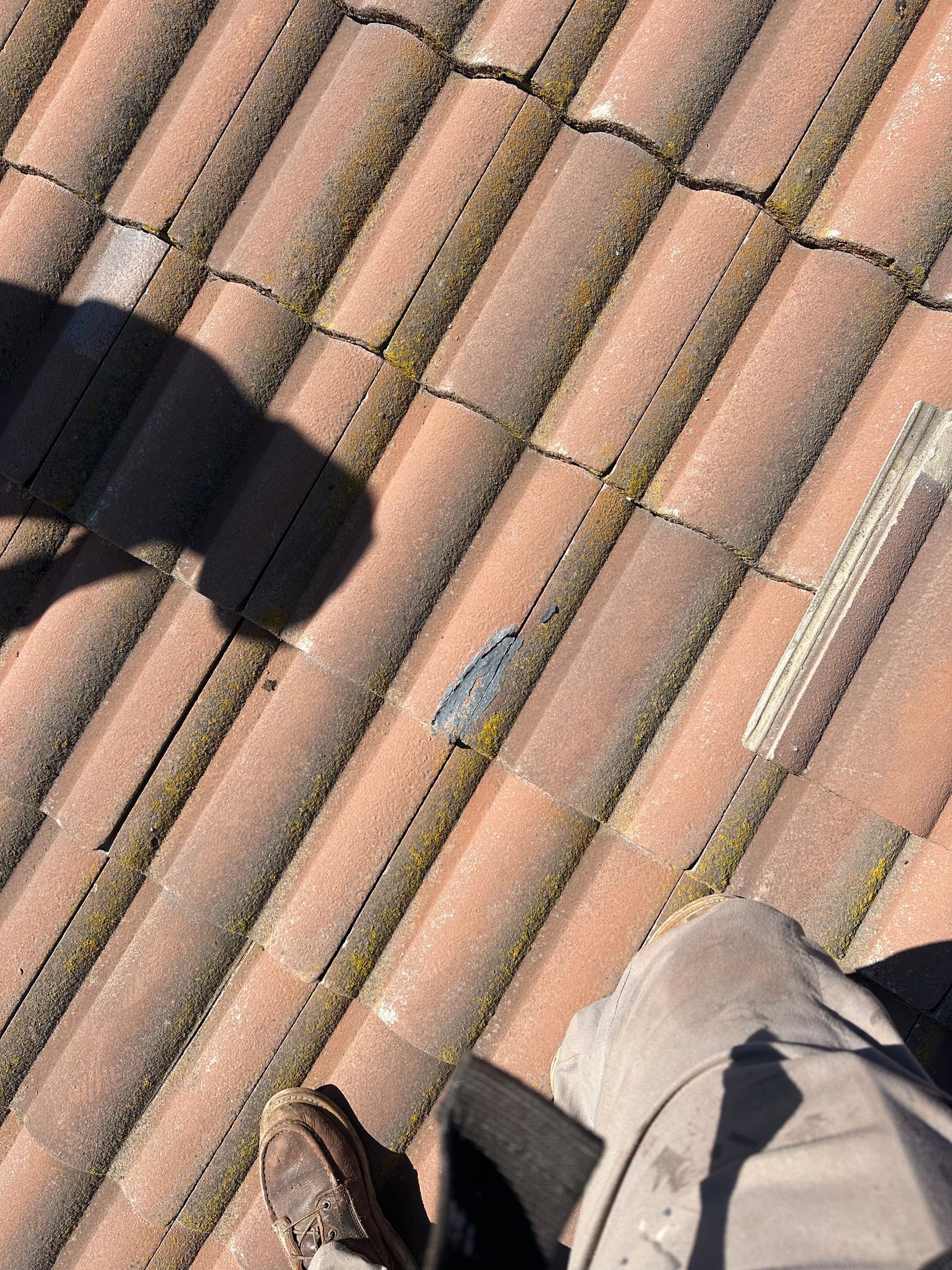 Tile Roof repair by Grandmark Service Company
