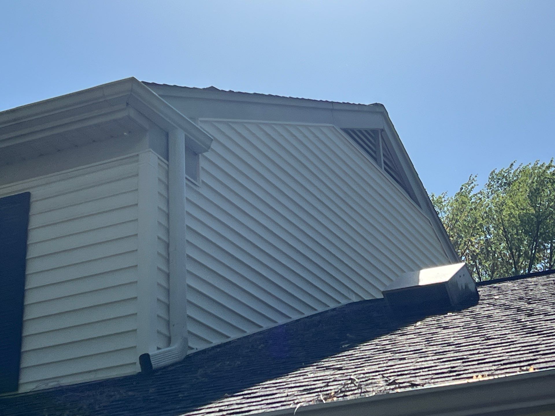 Housewashing  using Algaecide, soft wash soap by Northern Power Washing LLC.