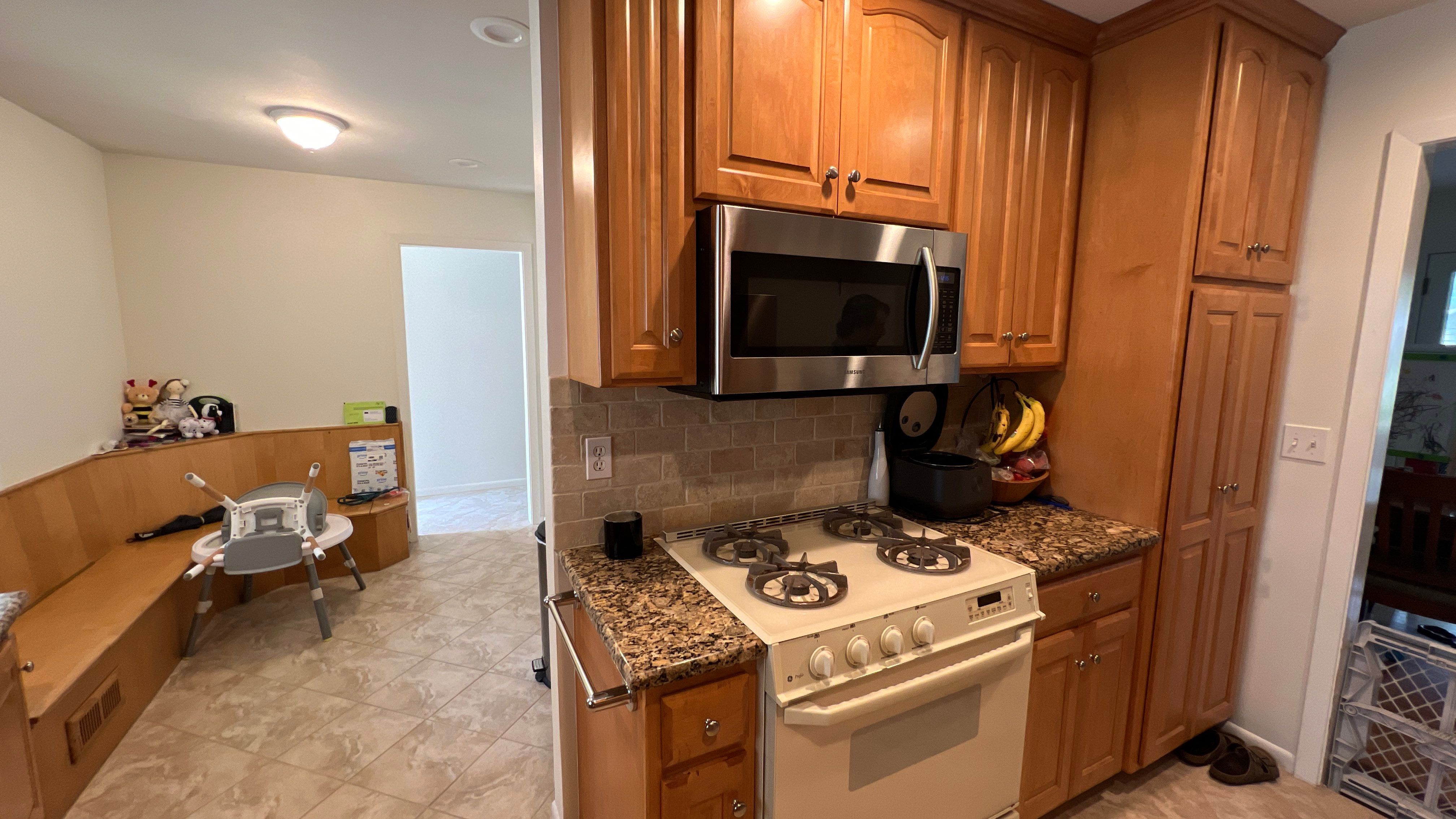 Elegant Transformation: Stained Cabinets Revamped with Sherwin-Williams Juniper by Cougar Painting
