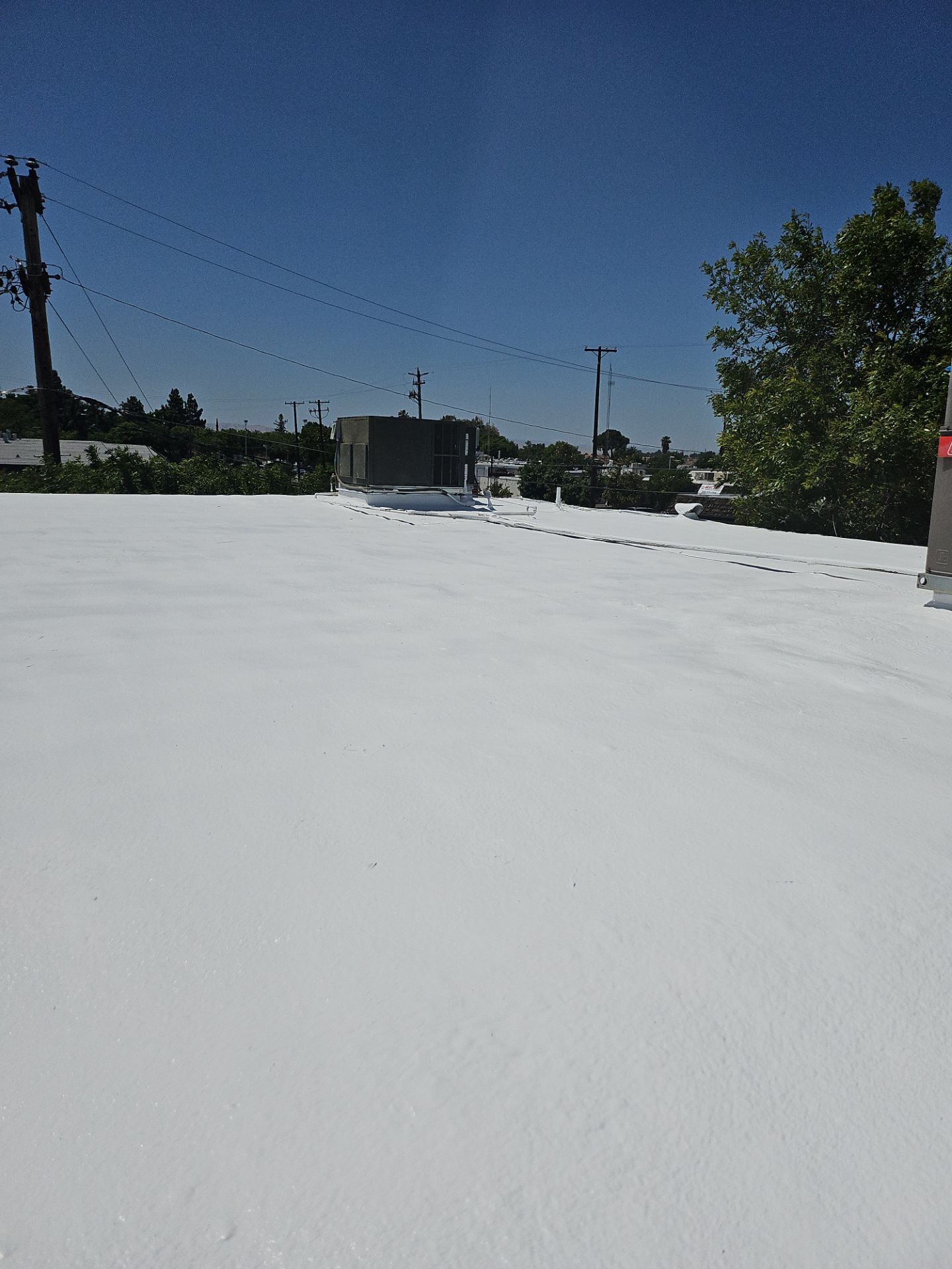 Foam Refurbish using General Coatings acrylic coatings and spray foam by Straight Edge Roofing Inc