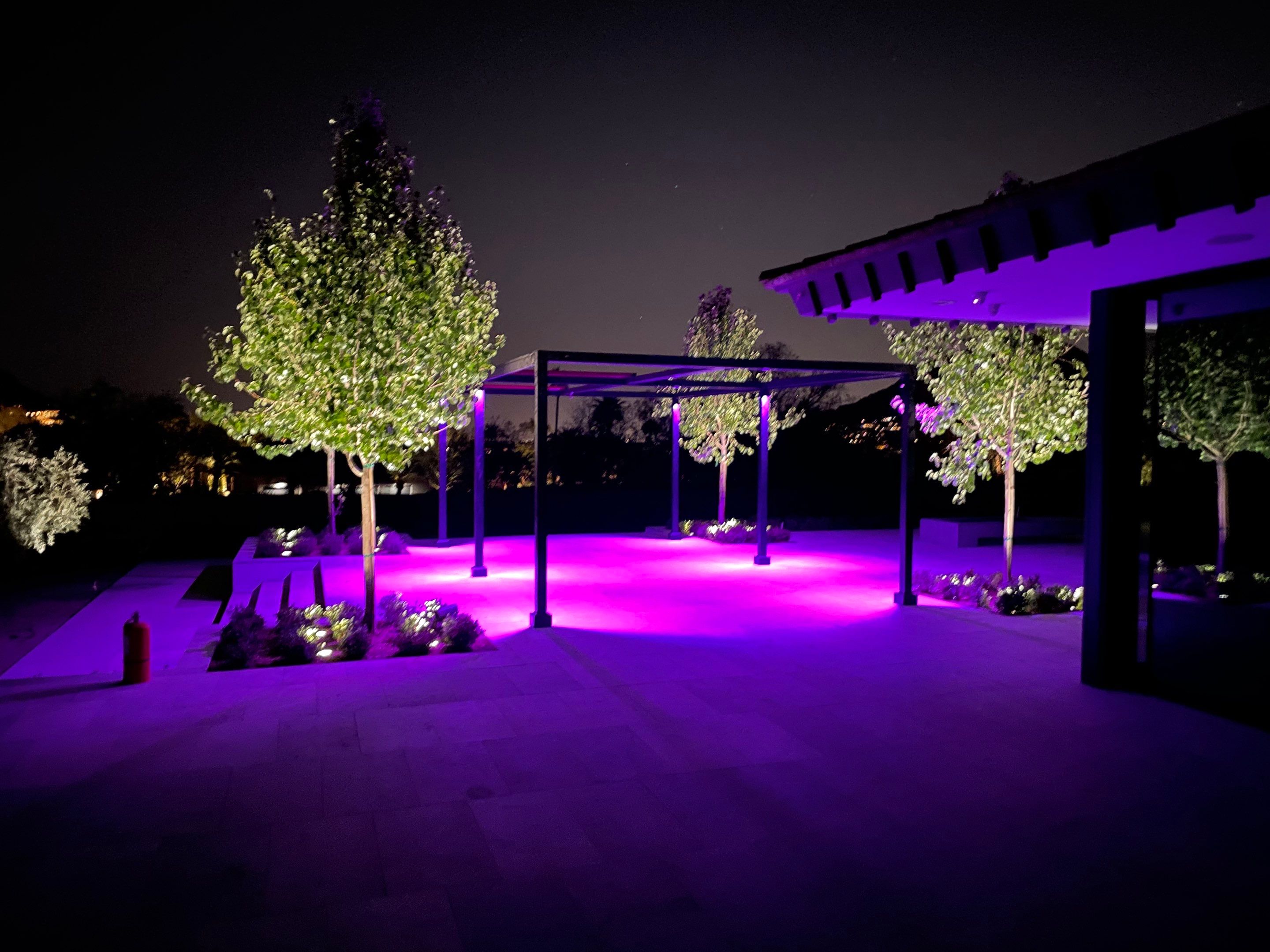 Colorful Outdoor Living Space in Paradise Valley by Outdoor Lights + Shades